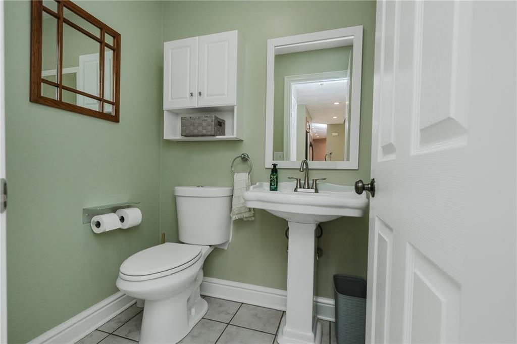 459 Forest Ridge Road Indiana, PA 15701 - Photo 18 of 45 a bathroom with a toilet sink and mirror