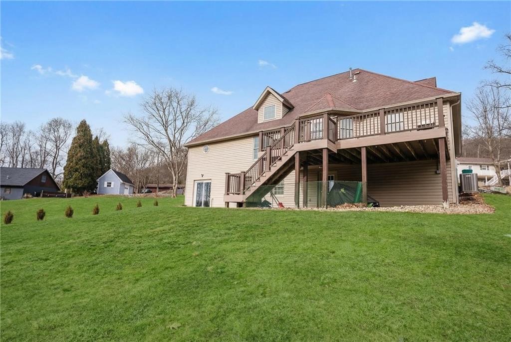 459 Forest Ridge Road Indiana, PA 15701 - Photo 2 of 45 a view of a house with a big yard and large trees