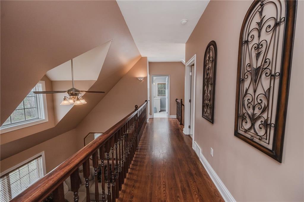 459 Forest Ridge Road Indiana, PA 15701 - Photo 27 of 45 a view of a hallway with wooden floor and stairs