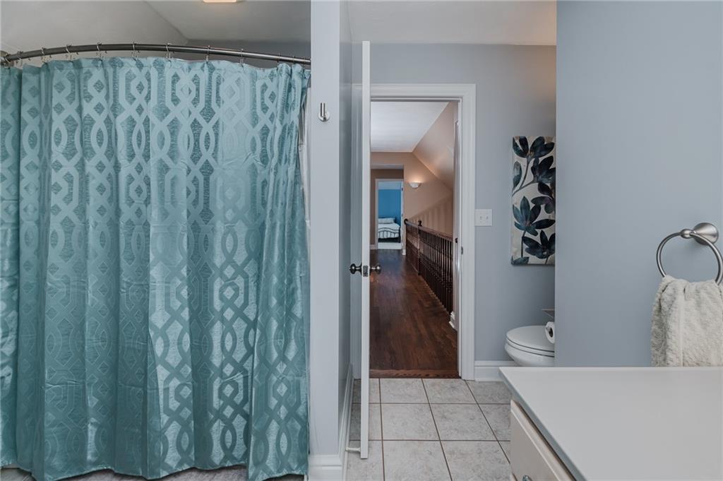 459 Forest Ridge Road Indiana, PA 15701 - Photo 29 of 45 a bathroom with a bathtub and shower
