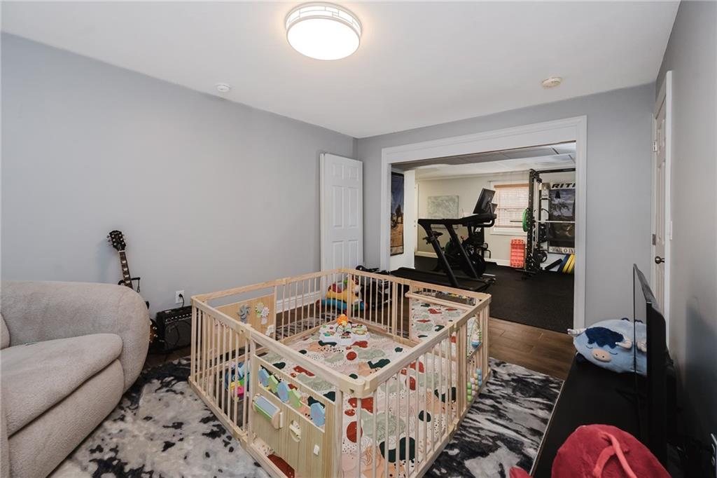459 Forest Ridge Road Indiana, PA 15701 - Photo 38 of 45 a living room with furniture and a wooden floor