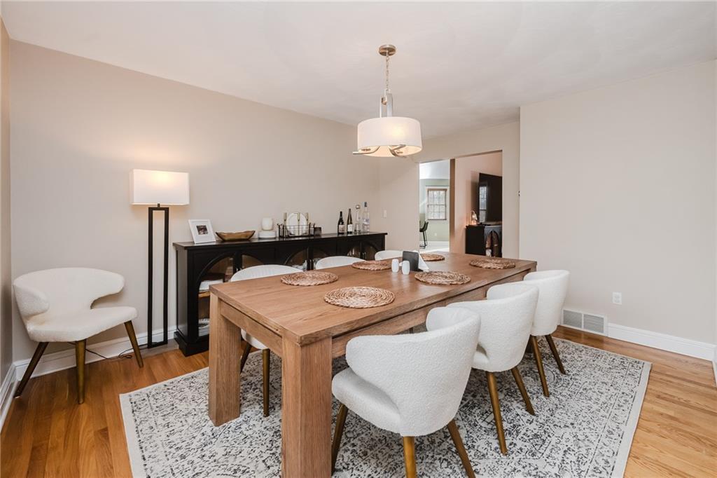 459 Forest Ridge Road Indiana, PA 15701 - Photo 7 of 45 a view of a dining room with furniture and wooden floor