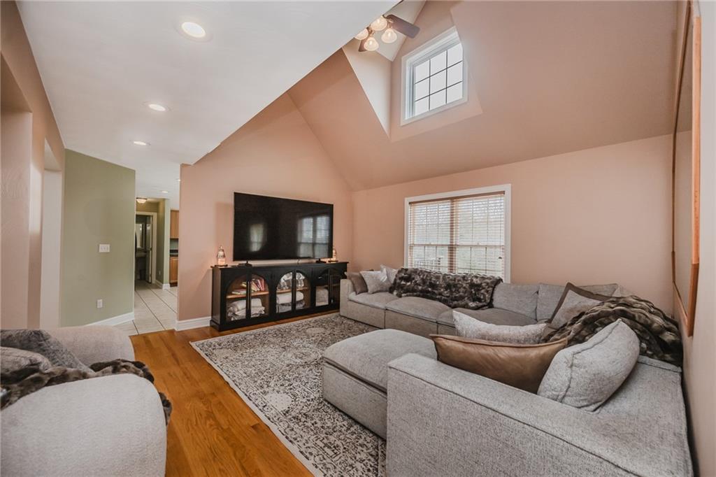 459 Forest Ridge Road Indiana, PA 15701 - Photo 8 of 45 a living room with furniture and a flat screen tv
