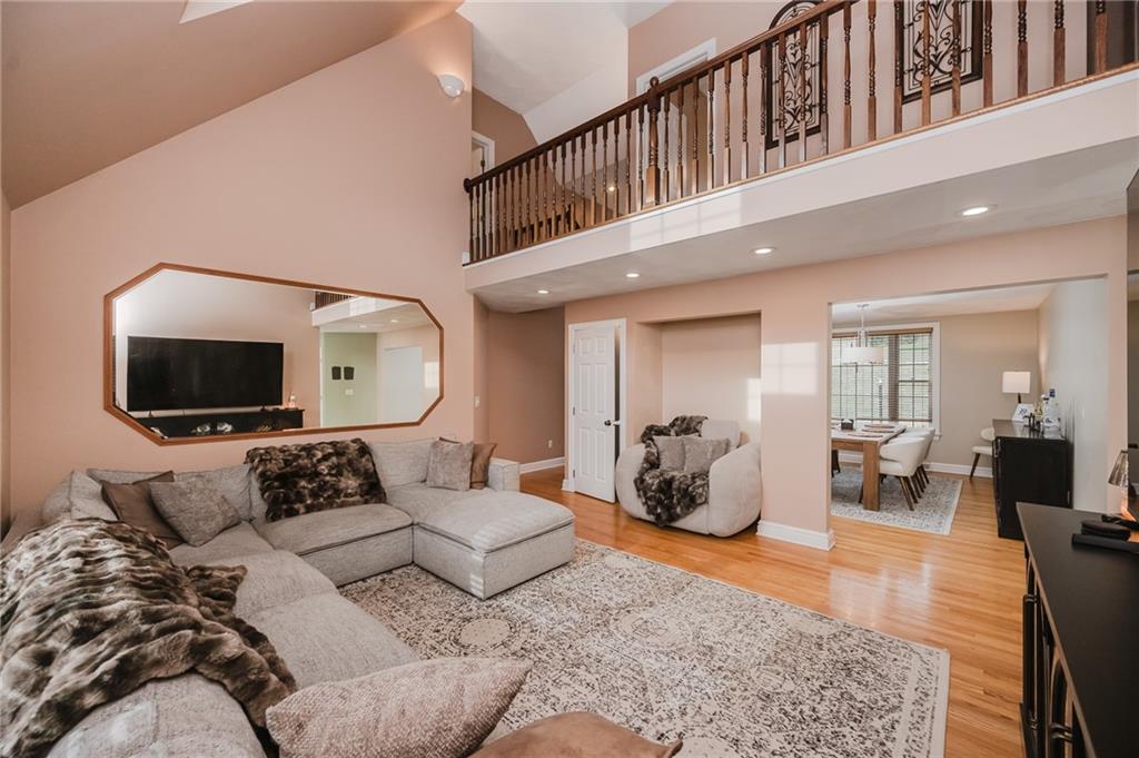 459 Forest Ridge Road Indiana, PA 15701 - Photo 9 of 45 a living room with furniture wooden floor and a flat screen tv