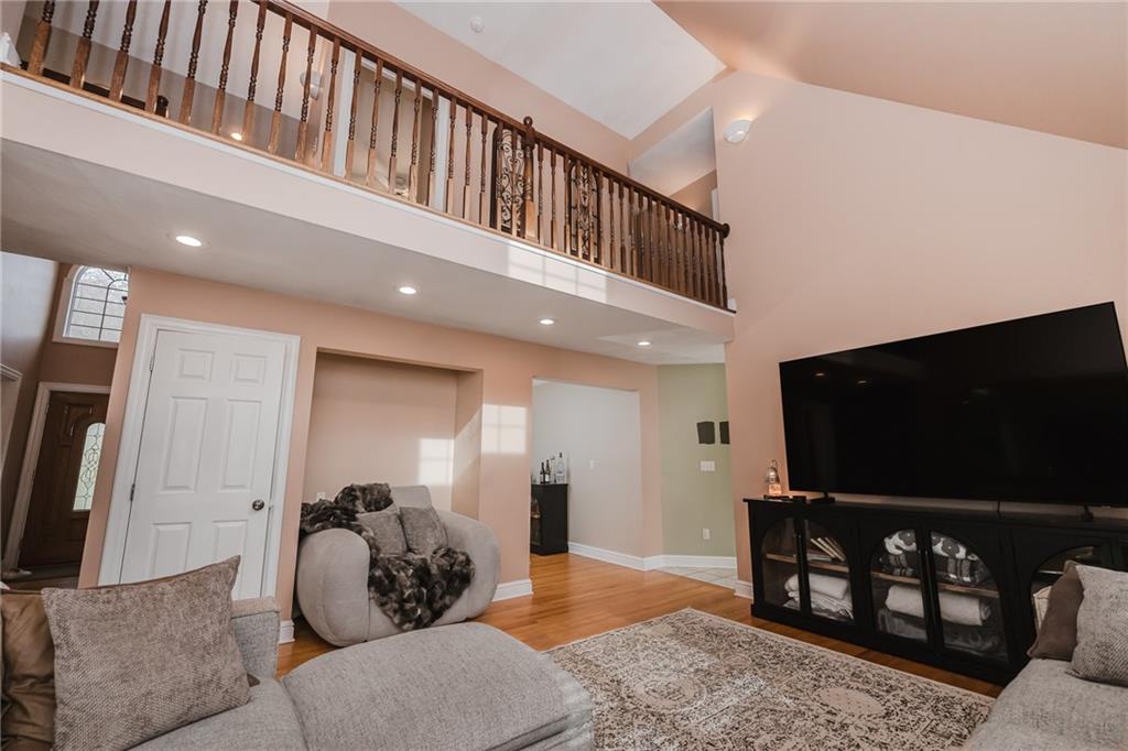 459 Forest Ridge Road Indiana, PA 15701 - Photo 10 of 45 a living room with furniture and a flat screen tv