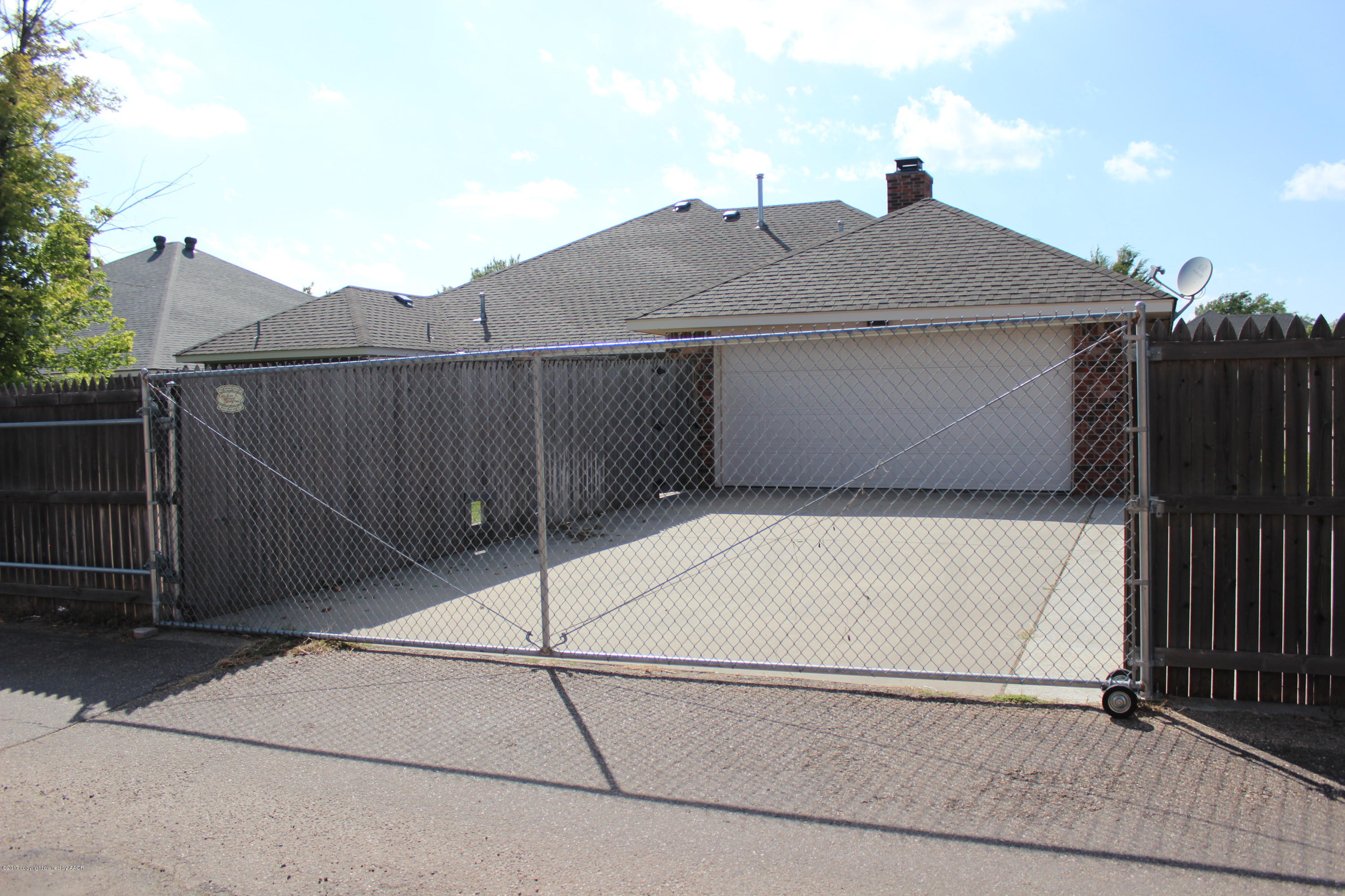 7911 Sheldon Road Amarillo, TX 79119 - Photo 29 of 30 Security Gate