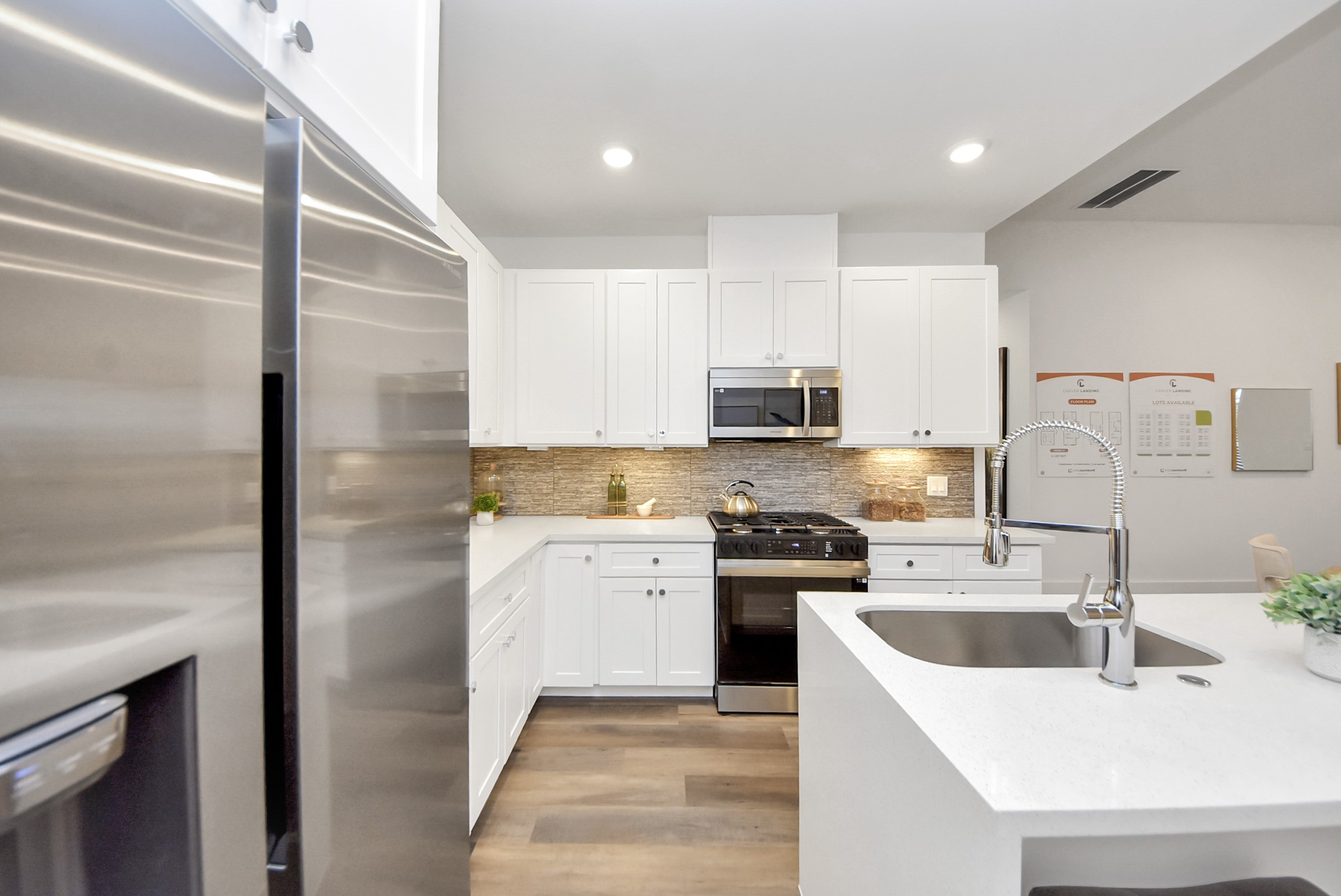 7502 Carver Road, Unit A Houston, TX 77088 - Photo 16 of 48 a kitchen with stainless steel appliances granite countertop a sink stove and refrigerator