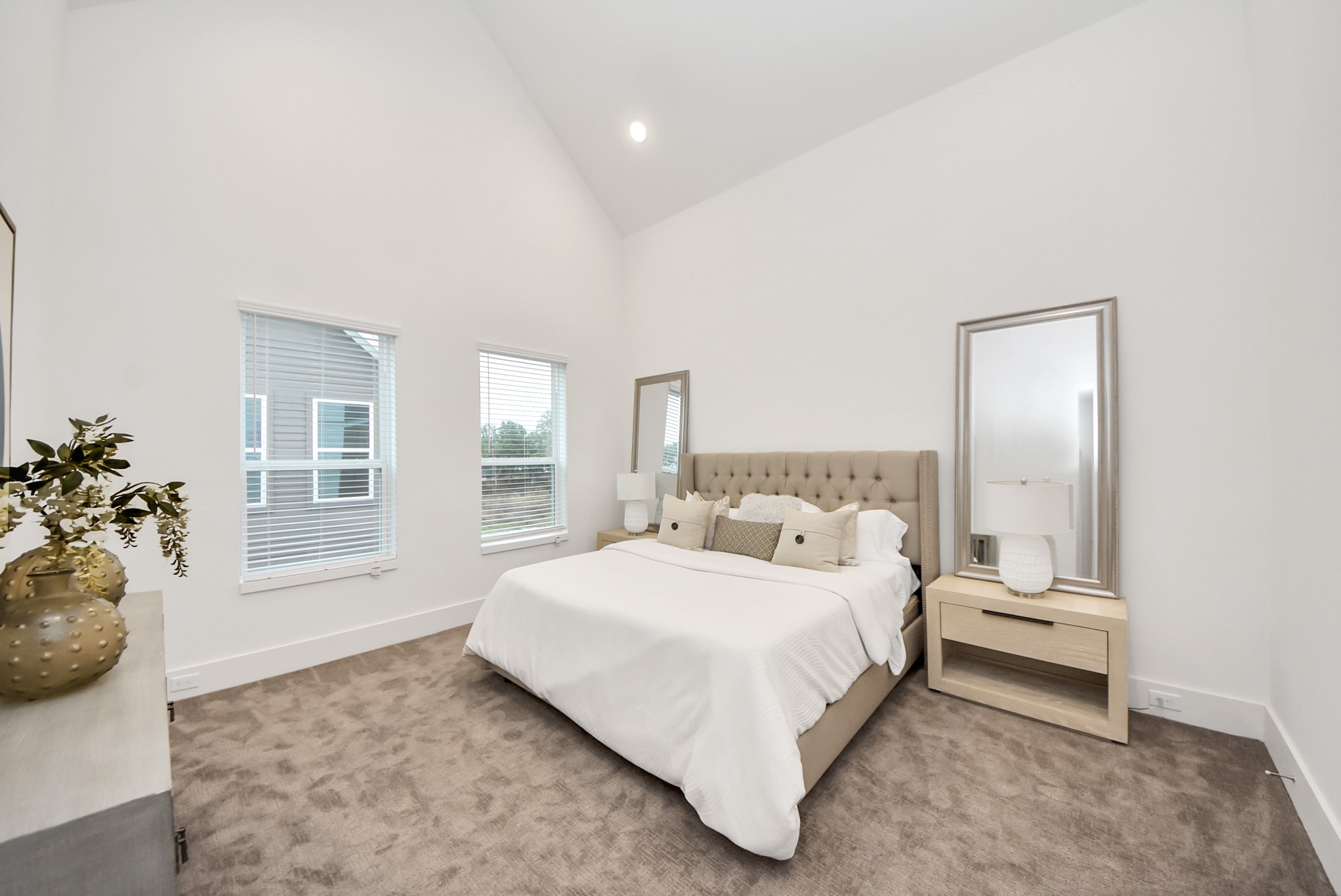 7502 Carver Road, Unit A Houston, TX 77088 - Photo 27 of 48 a bedroom with a bed and window