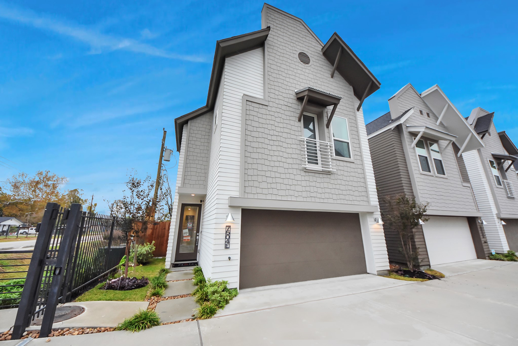 7502 Carver Road, Unit A Houston, TX 77088 - Photo 3 of 48 a front view of a house with a yard