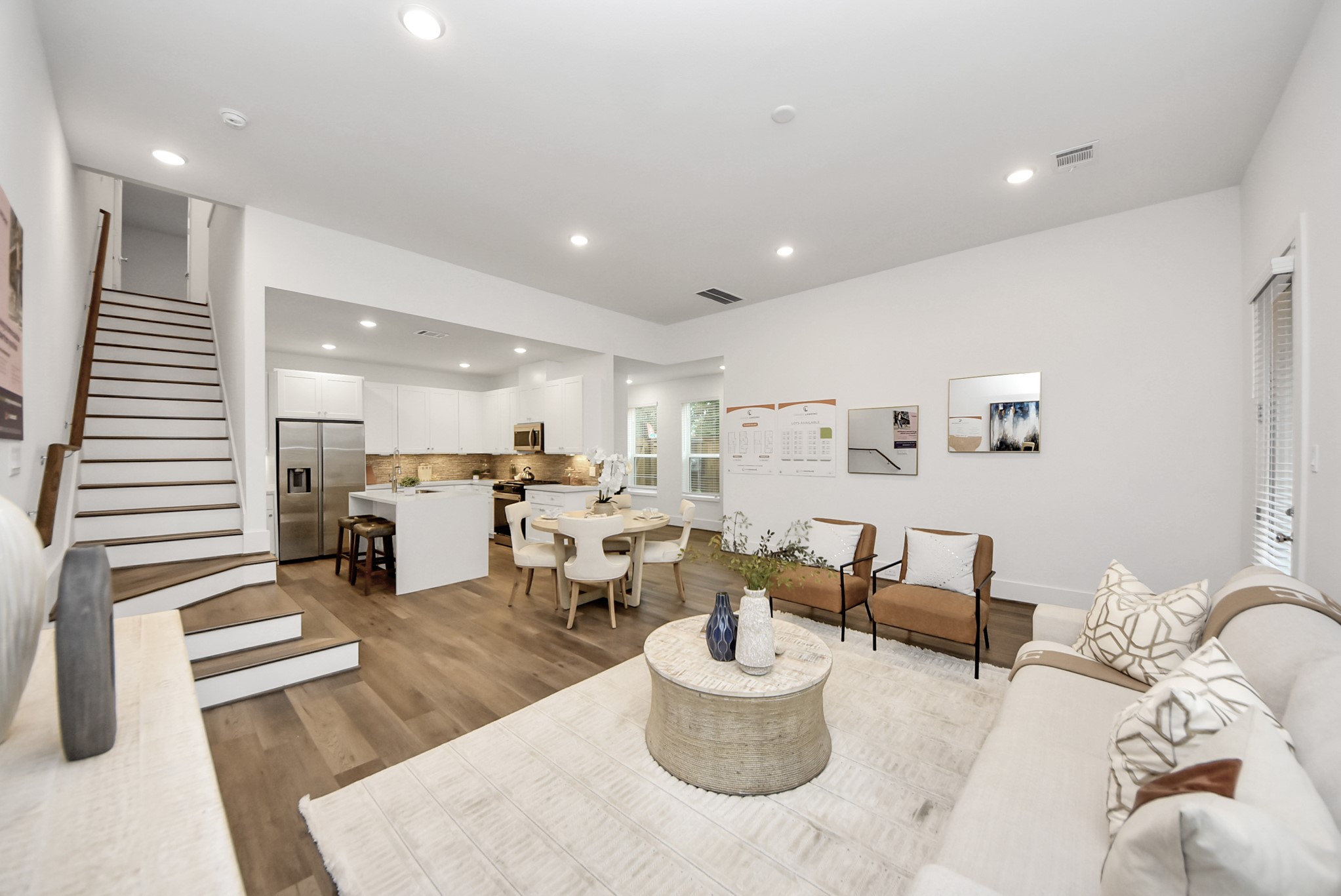 7502 Carver Road, Unit A Houston, TX 77088 - Photo 8 of 48 a living room with furniture and a dining table with kitchen view