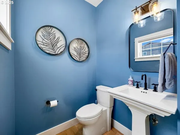 a bathroom with a toilet and a sink