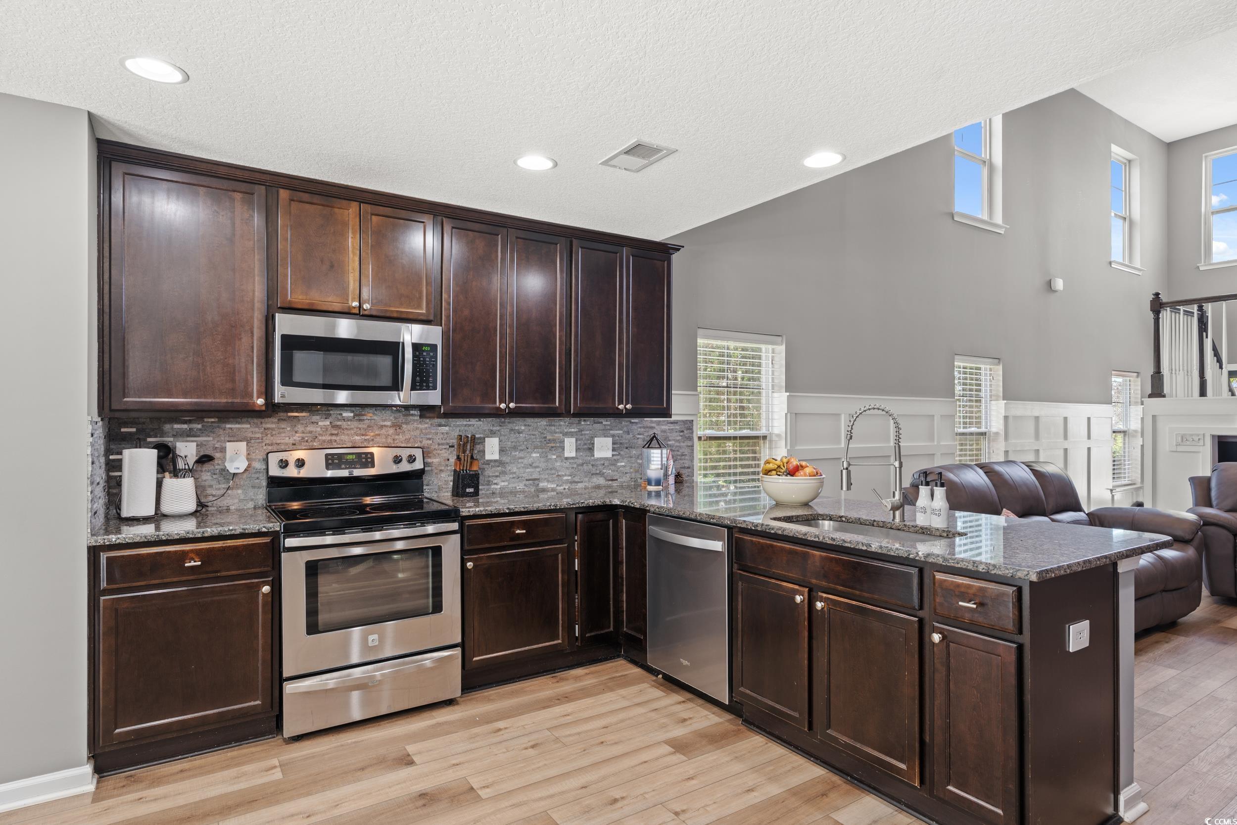 276 Whipple Run Loop Myrtle Beach, SC 29588 - Photo 17 of 40 Kitchen with stainless steel appliances, a peninsu