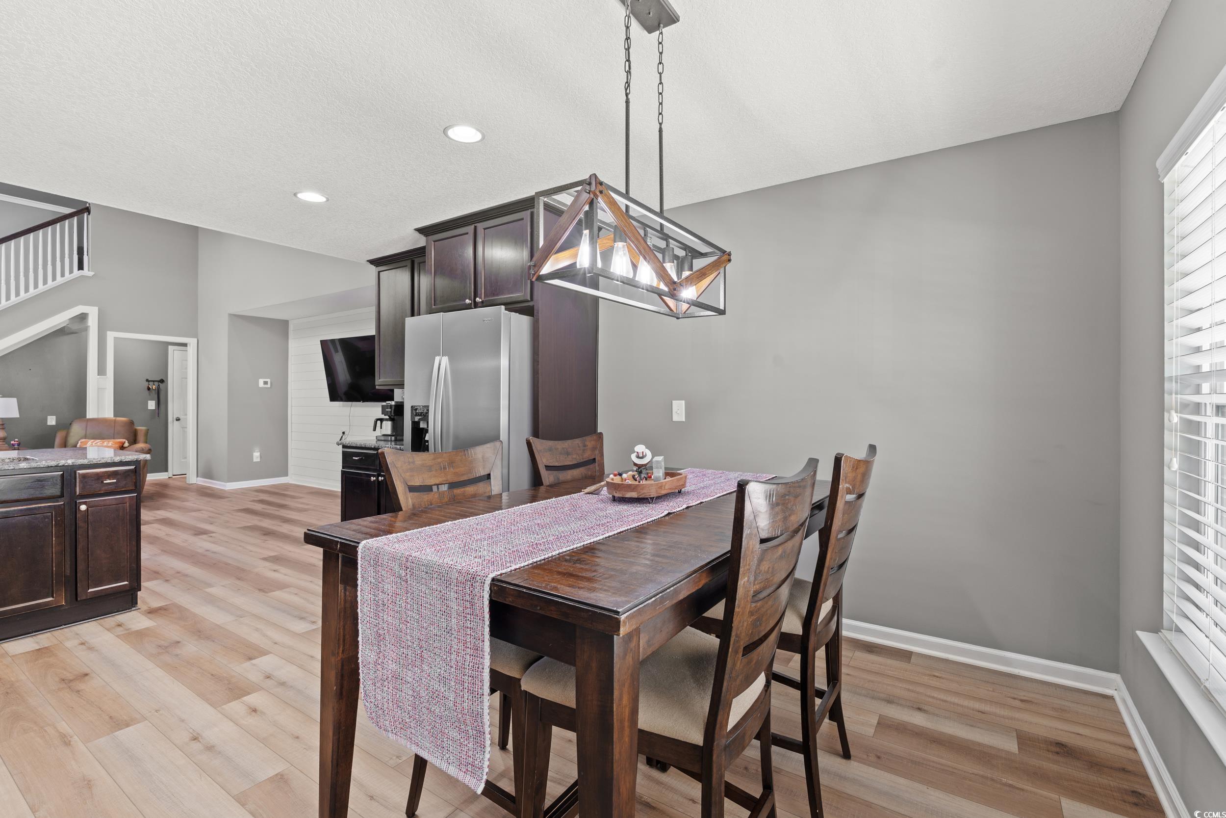 276 Whipple Run Loop Myrtle Beach, SC 29588 - Photo 19 of 40 Dining area featuring light wood finished floors a
