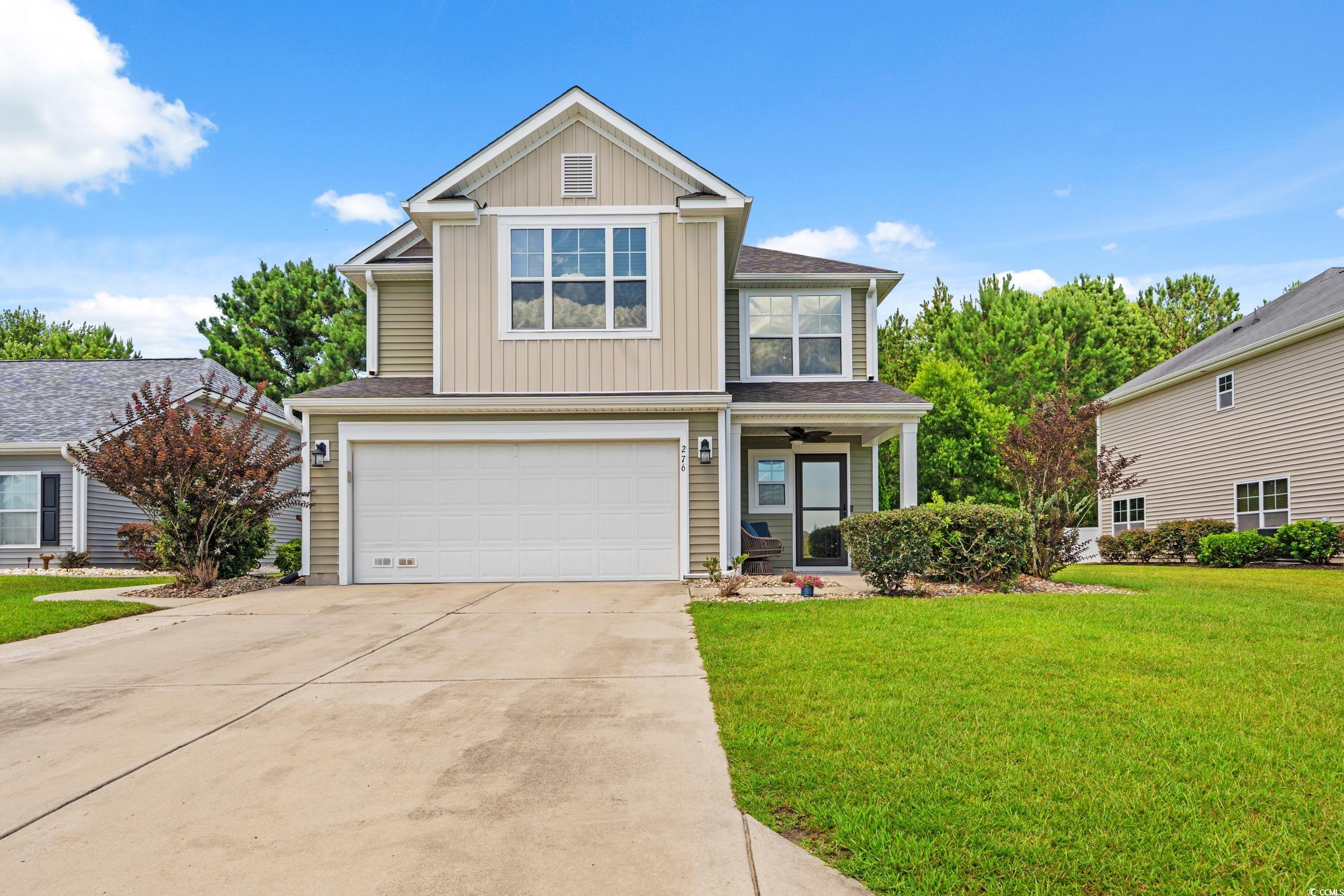 276 Whipple Run Loop Myrtle Beach, SC 29588 - Photo 2 of 40 View of front facade featuring board and batten si