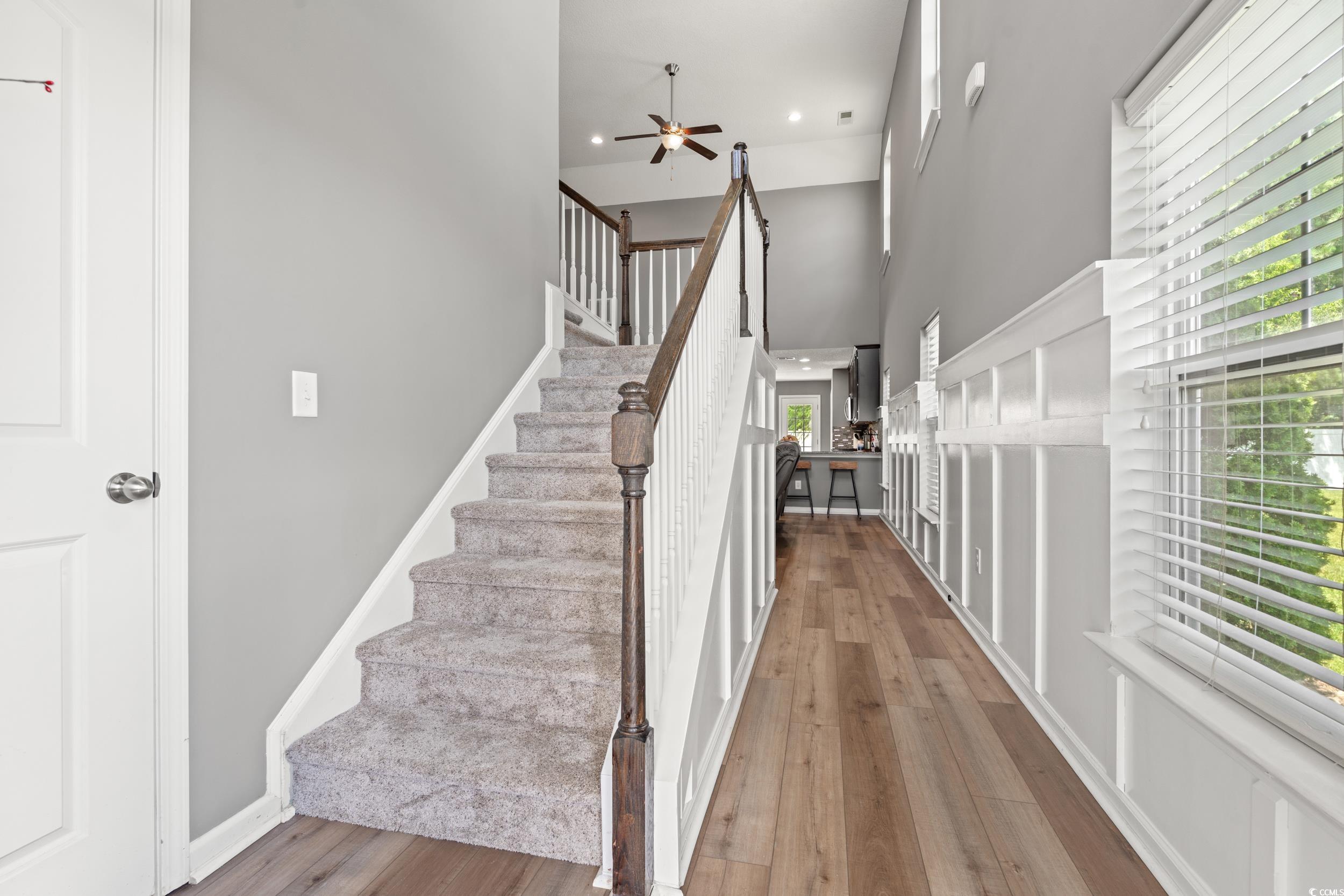 276 Whipple Run Loop Myrtle Beach, SC 29588 - Photo 21 of 40 Stairs with wood finished floors, ceiling fan, a t