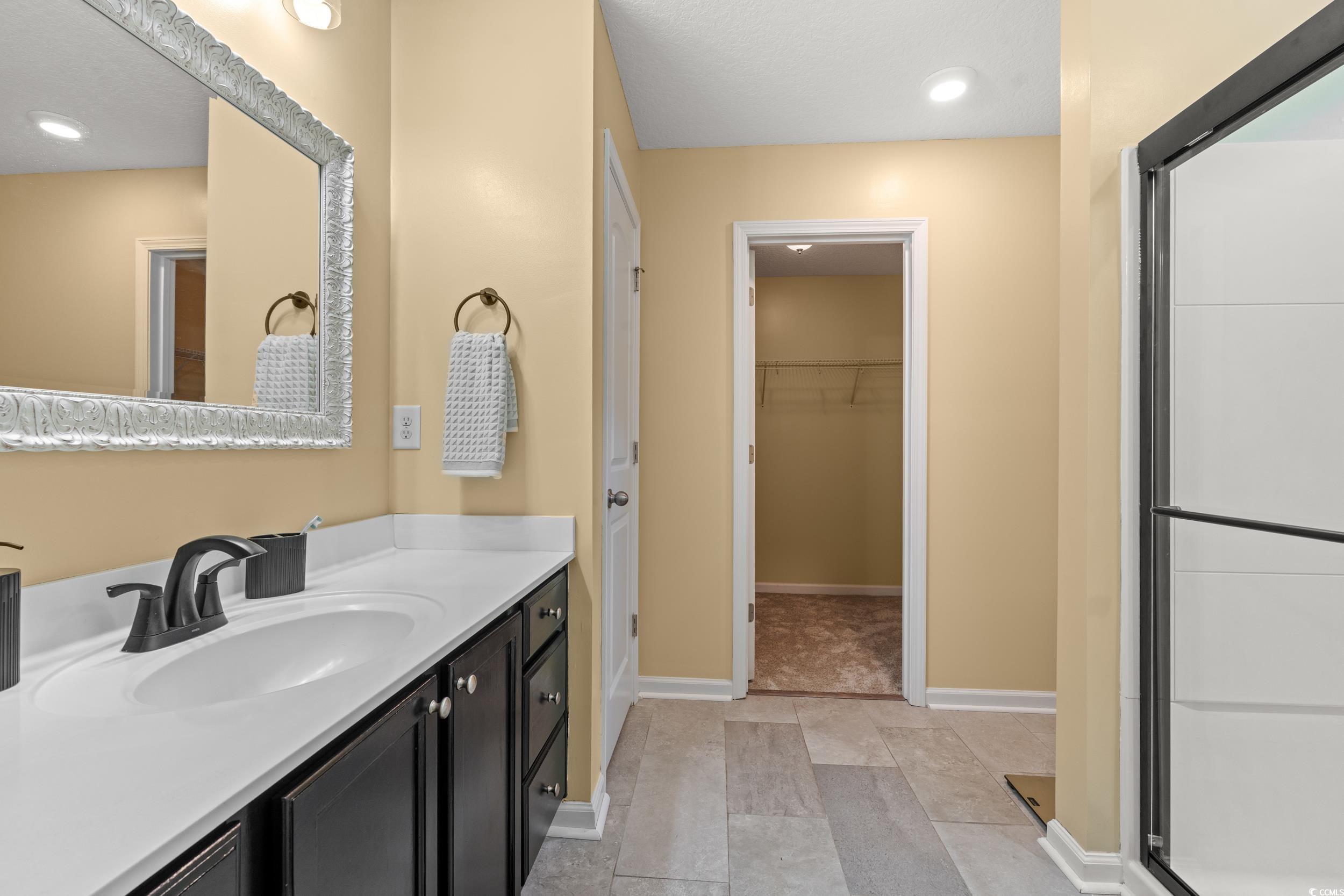 276 Whipple Run Loop Myrtle Beach, SC 29588 - Photo 26 of 40 Full bathroom with vanity, a spacious closet, rece