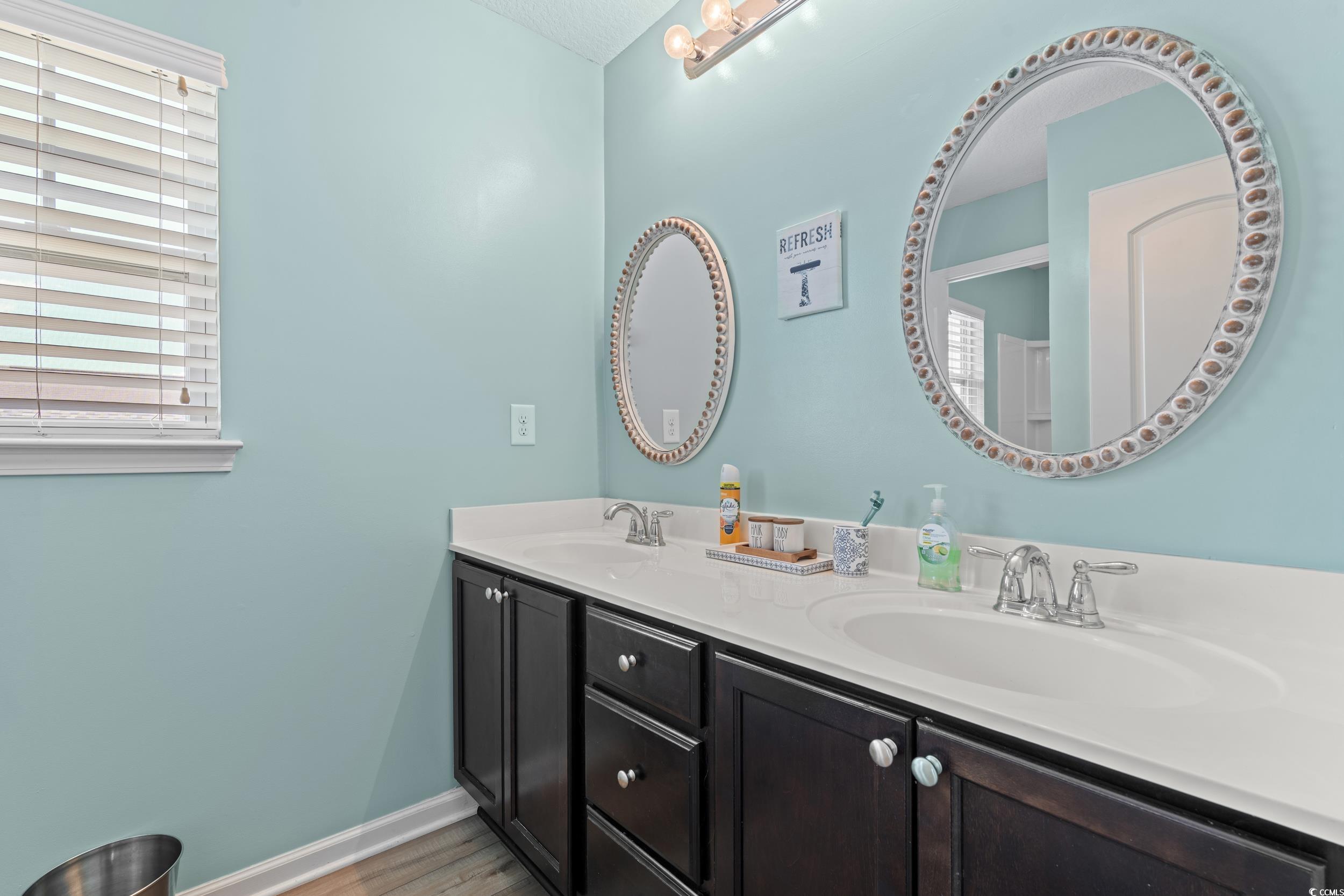 276 Whipple Run Loop Myrtle Beach, SC 29588 - Photo 32 of 40 Full bathroom featuring double vanity and wood fin