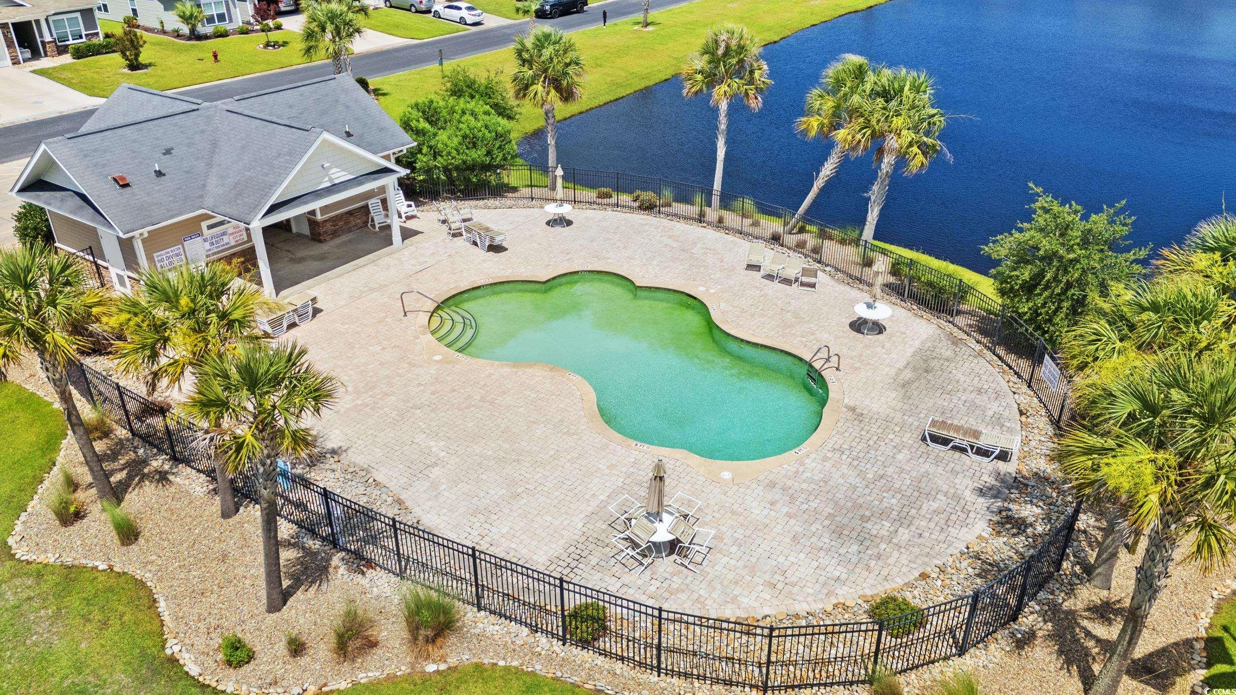 276 Whipple Run Loop Myrtle Beach, SC 29588 - Photo 38 of 40 Aerial view of a large body of water and a pool ar