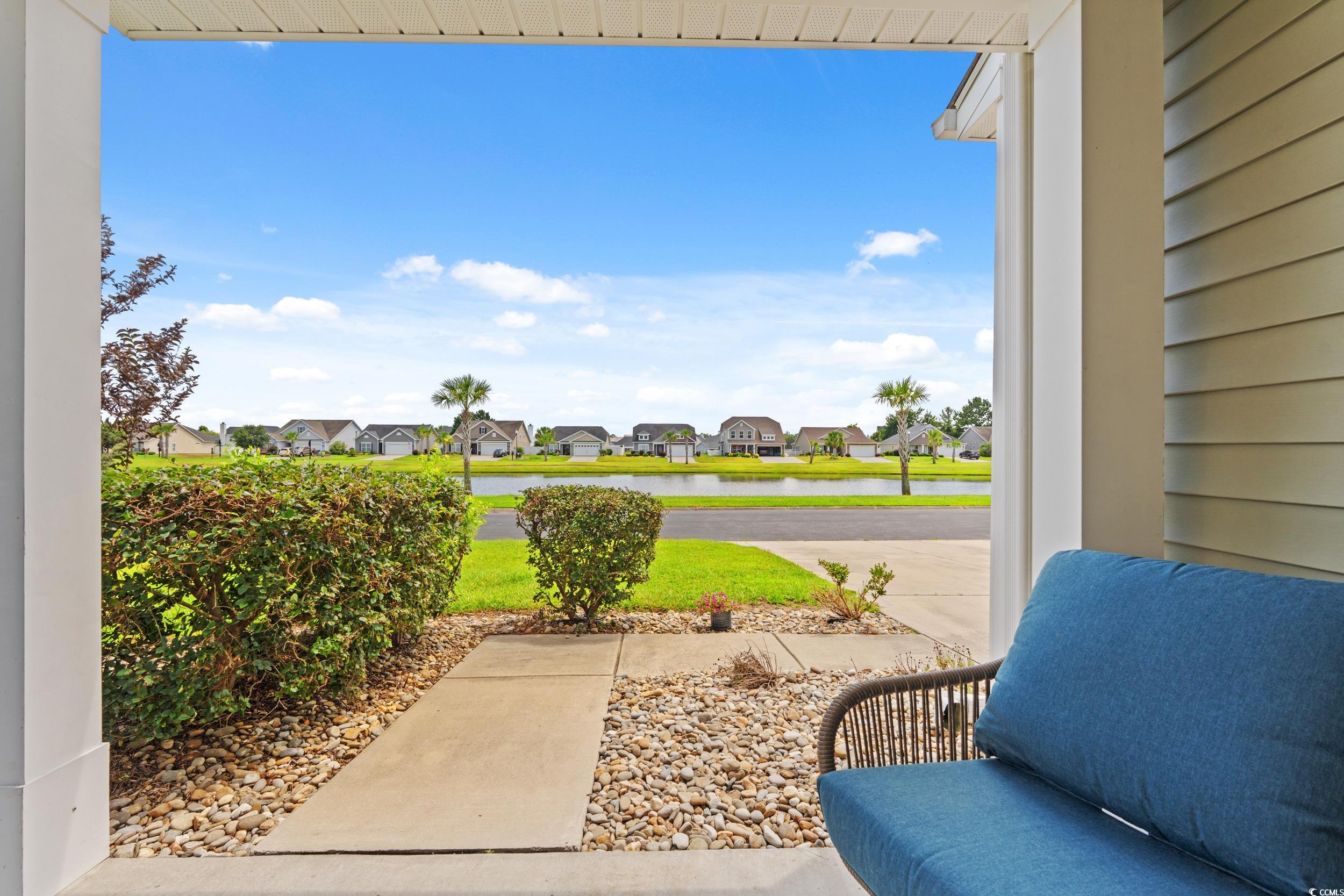 276 Whipple Run Loop Myrtle Beach, SC 29588 - Photo 7 of 40 View of patio / terrace with a residential view an