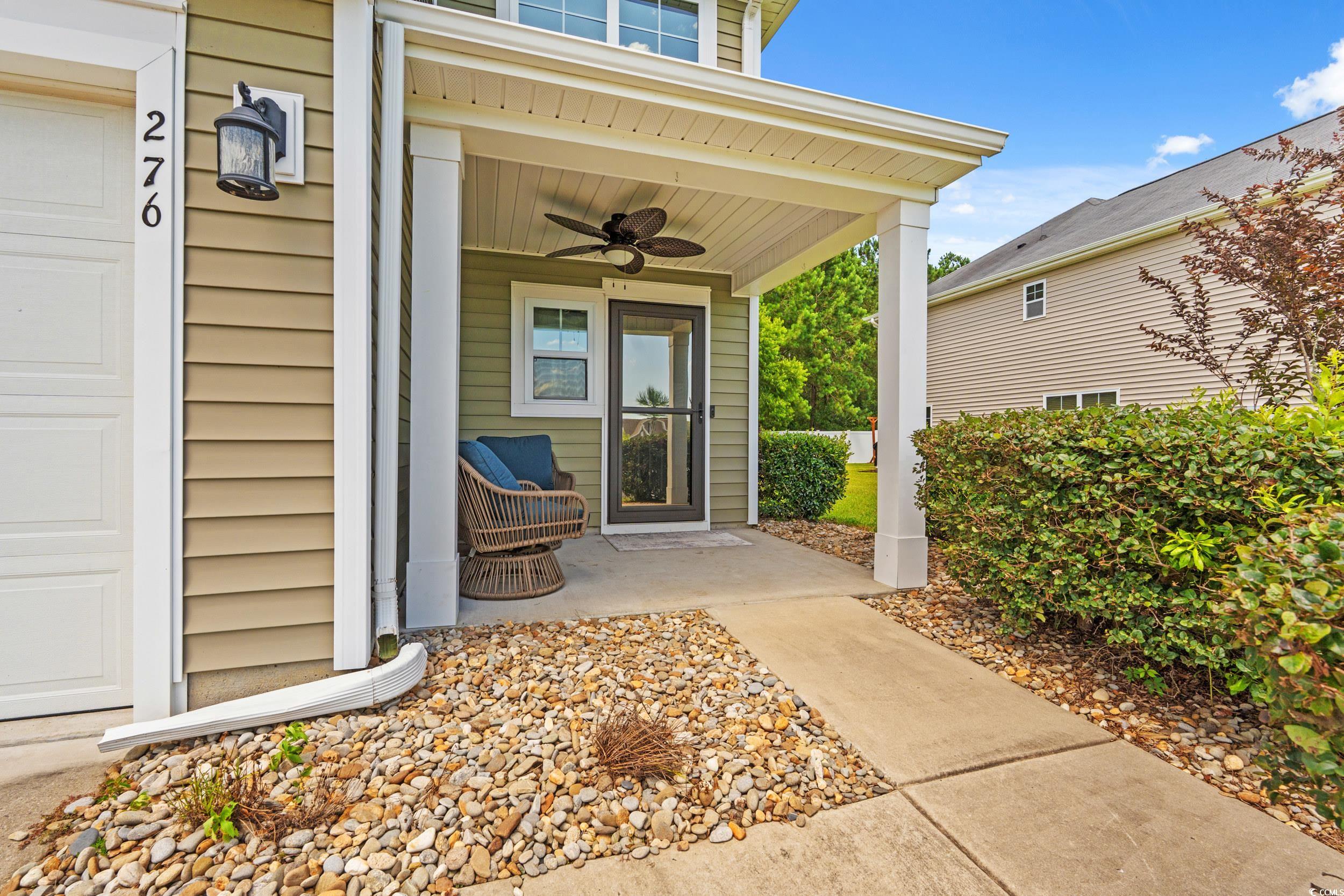 276 Whipple Run Loop Myrtle Beach, SC 29588 - Photo 9 of 40 Property entrance with a ceiling fan and covered p