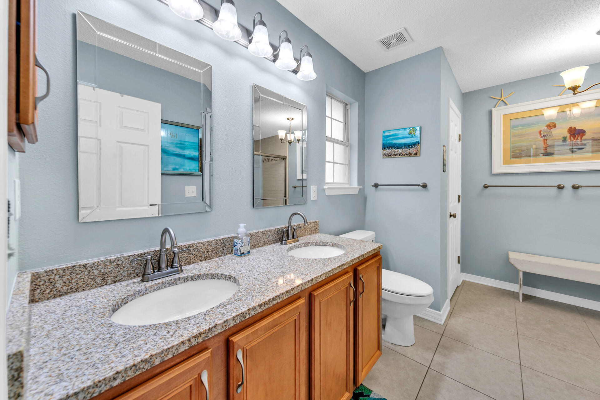 224 Bayou Landing Road Santa Rosa Beach, FL 32459 - Photo 11 of 25 a bathroom with a granite countertop double vanity sink and a mirror