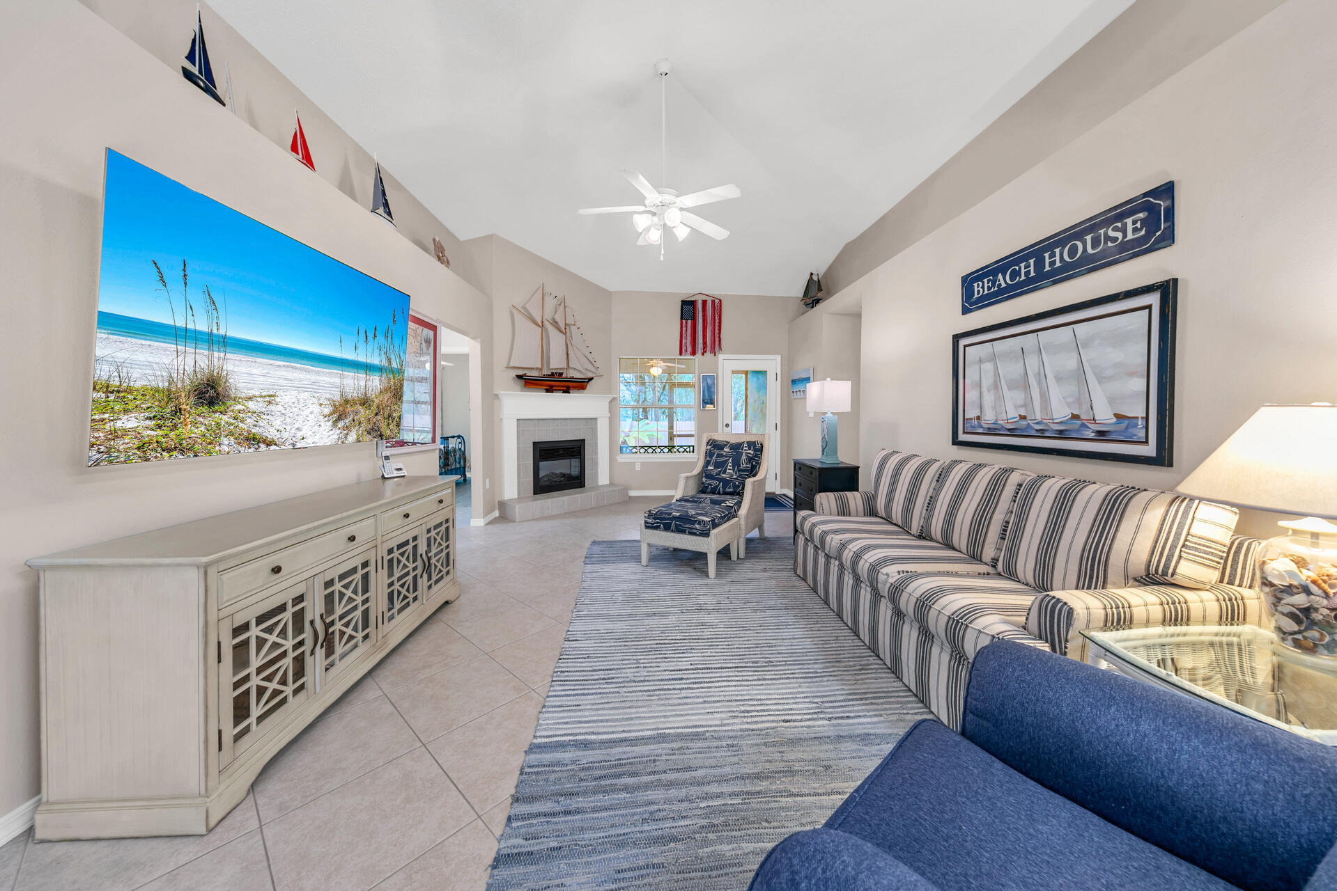 224 Bayou Landing Road Santa Rosa Beach, FL 32459 - Photo 22 of 25 a living room with furniture and a fireplace