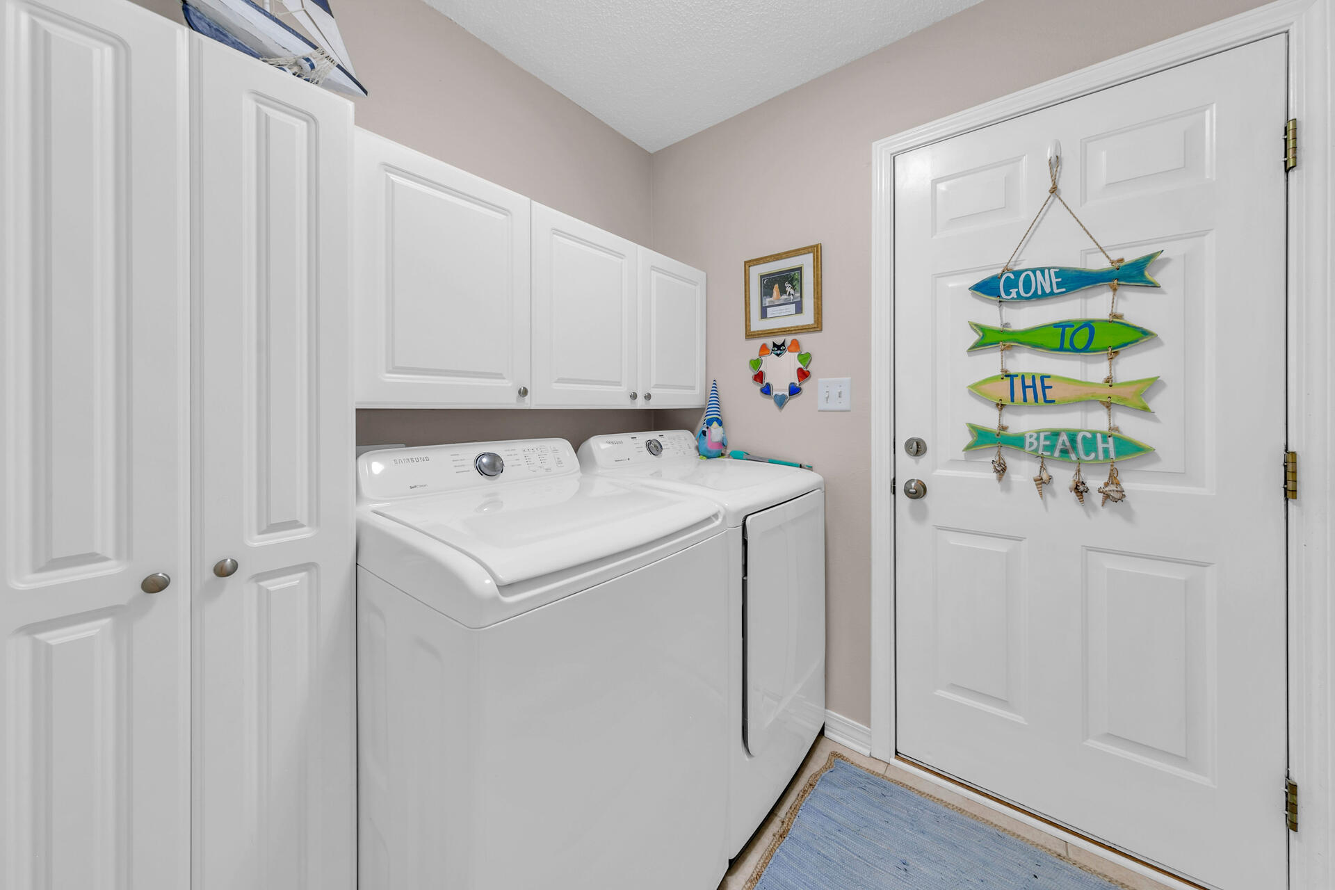 224 Bayou Landing Road Santa Rosa Beach, FL 32459 - Photo 25 of 25 a utility room with dryer and washer