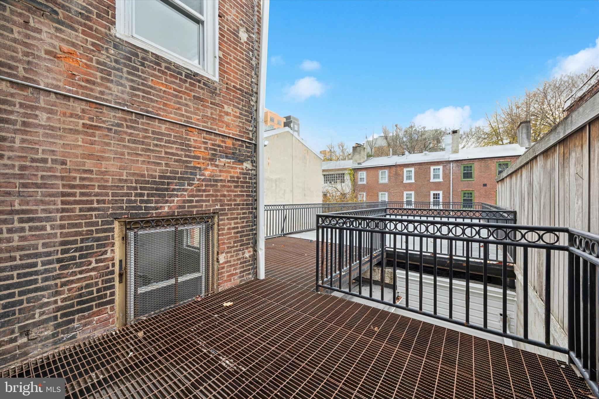 251 South 12th Street, Unit 2 Philadelphia, PA 19107 - Photo 5 of 10 a view of a balcony with wooden floor