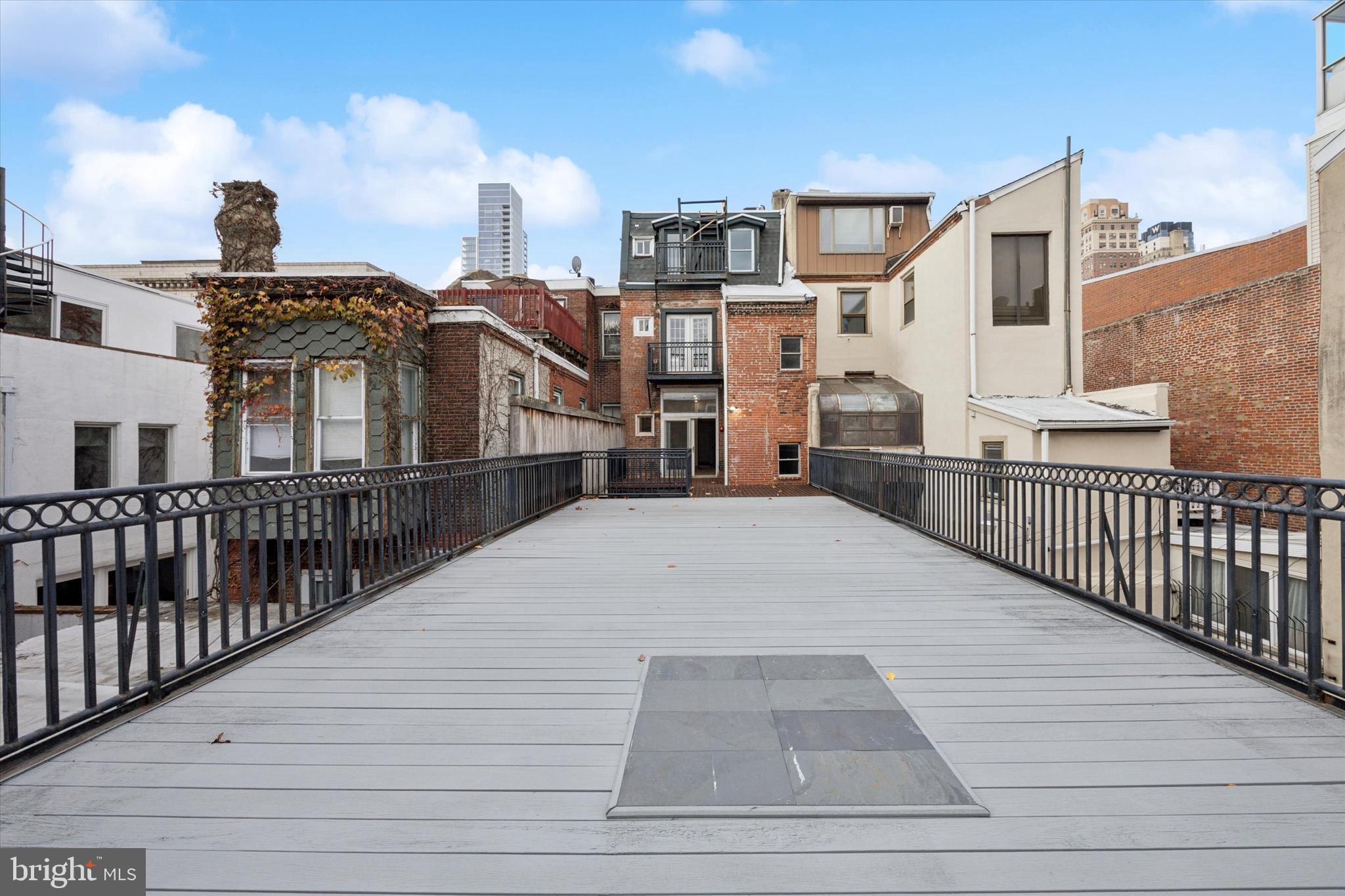 251 South 12th Street, Unit 2 Philadelphia, PA 19107 - Photo 6 of 10 a view of a city from a balcony