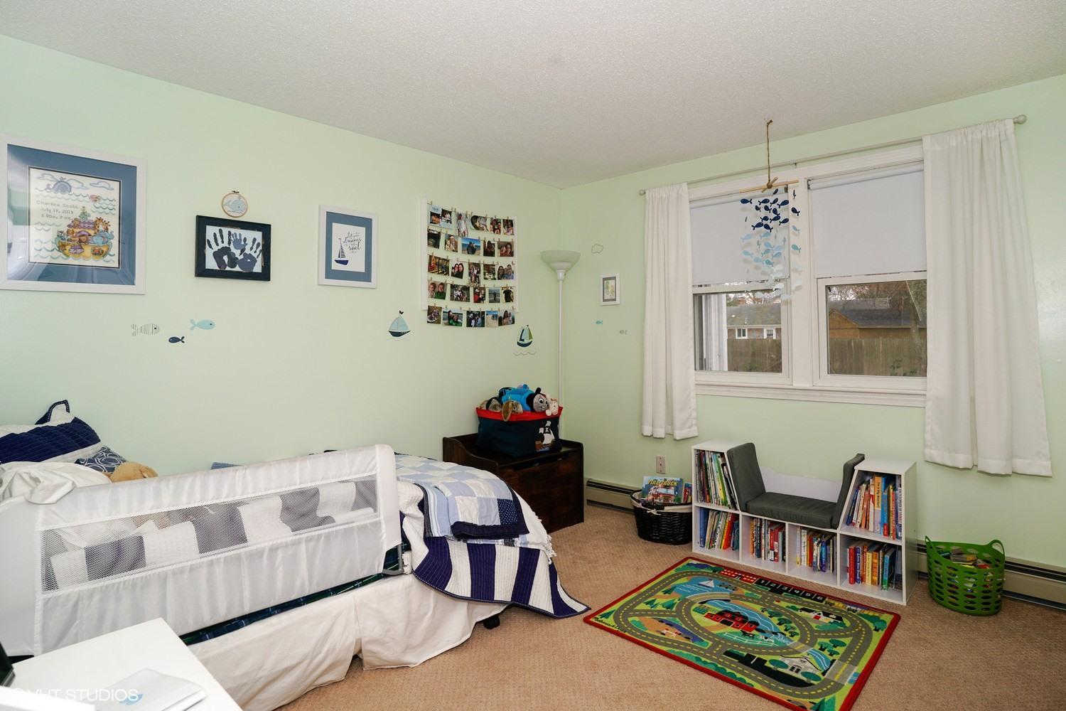 16 Foxglove Road Centerville, MA 02632 - Photo 12 of 15 a living room with furniture and a window