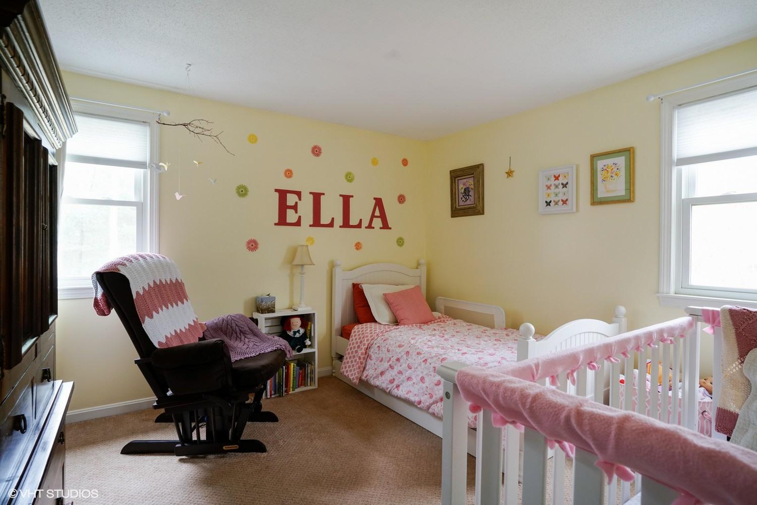 16 Foxglove Road Centerville, MA 02632 - Photo 13 of 15 a bedroom with two beds and chair