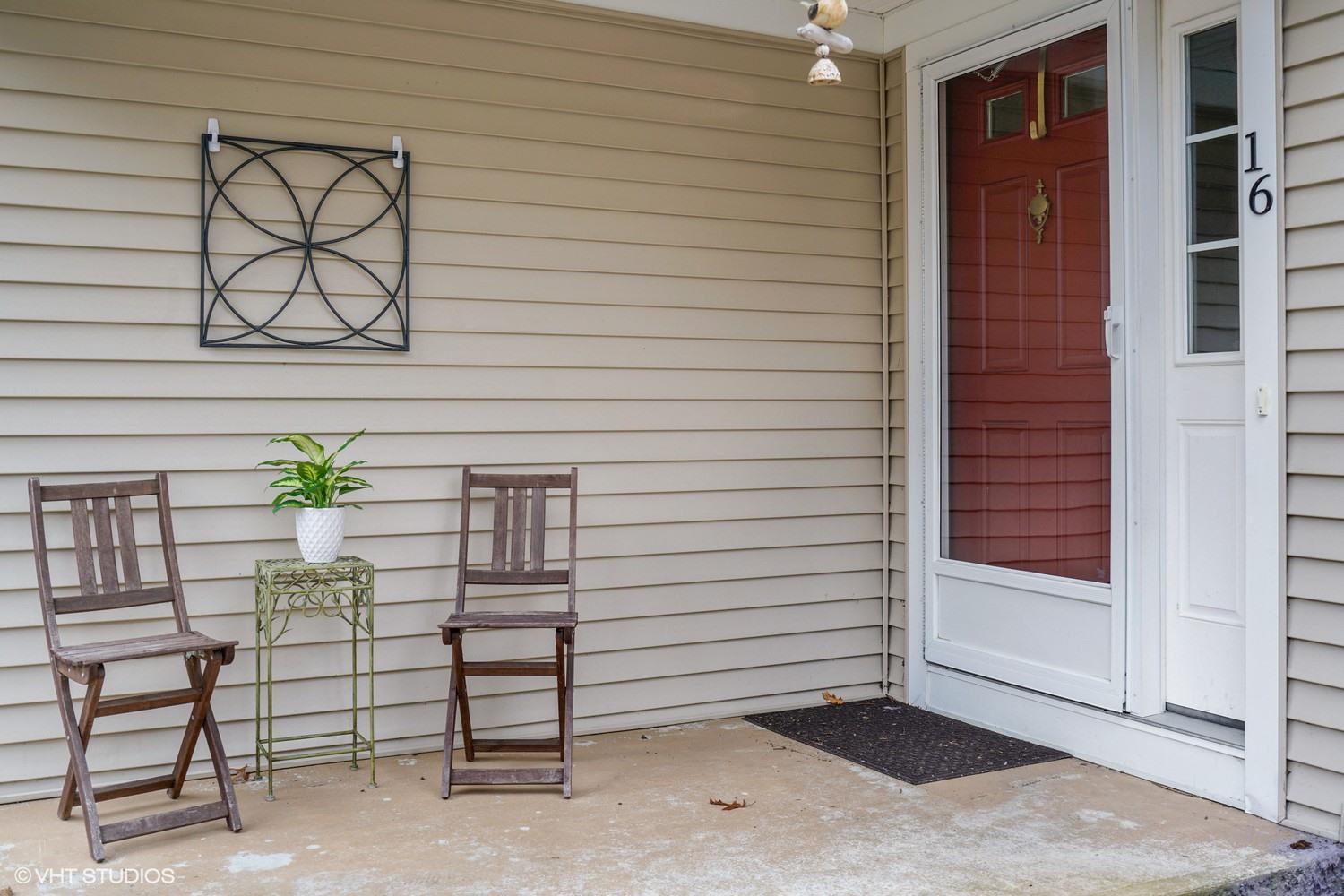 16 Foxglove Road Centerville, MA 02632 - Photo 15 of 15 a view of a porch with a bench