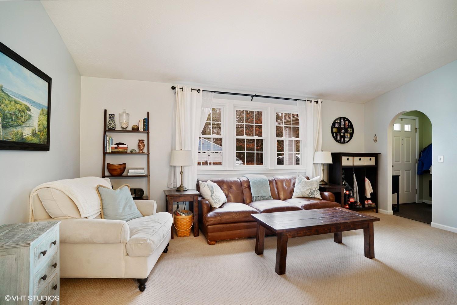 16 Foxglove Road Centerville, MA 02632 - Photo 2 of 15 a living room with furniture a rug and a wall painting