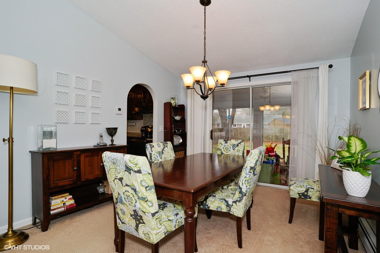16 Foxglove Road Centerville, MA 02632 - Photo 5 of 15 a view of a dining room with furniture window and outside view