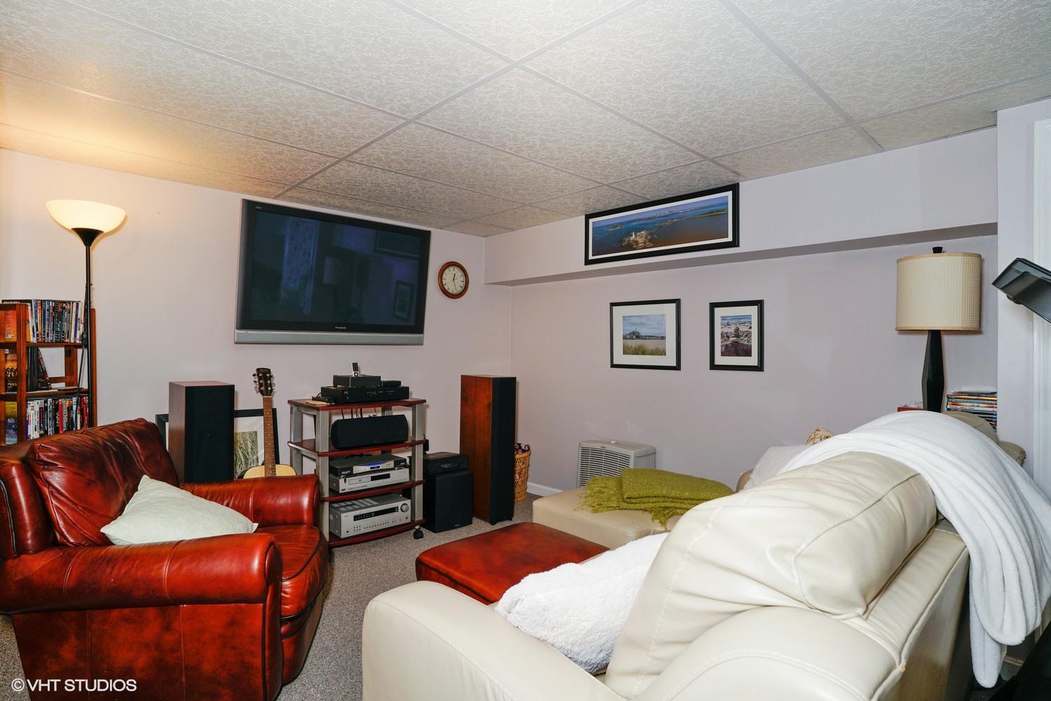 16 Foxglove Road Centerville, MA 02632 - Photo 8 of 15 a living room with furniture and a flat screen tv