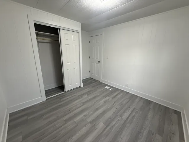 a bathroom with a toilet and a bathtub