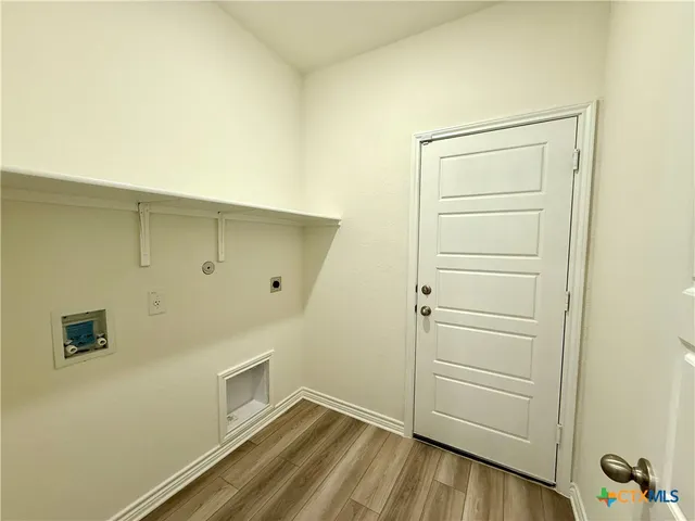 a bathroom with a sink toilet and mirror