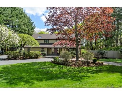 a view of an house with backyard space and garden