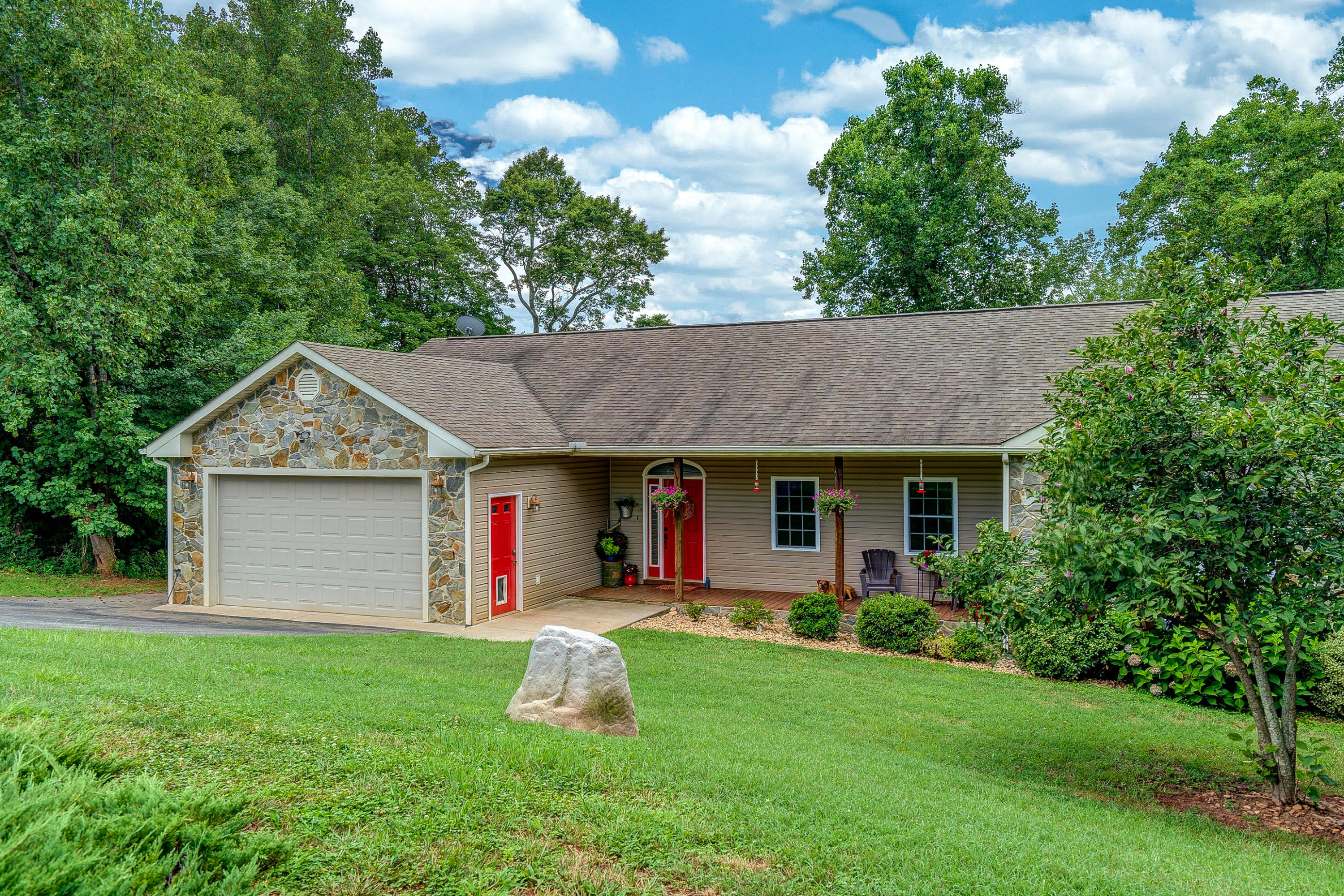 1205 Summit View Road Goodview, VA 24095 - Photo 2 of 46 a front view of house with yard and green space