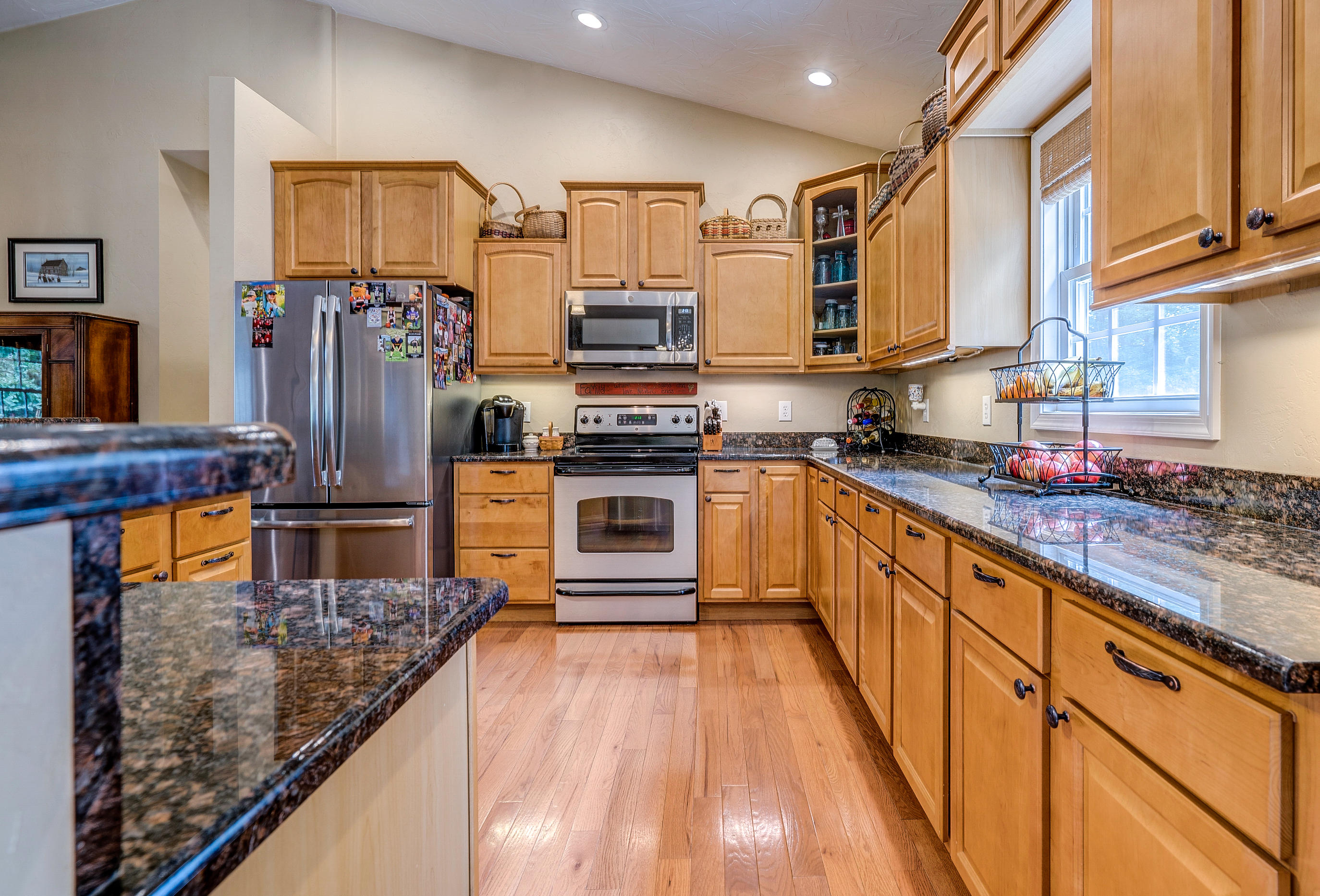 1205 Summit View Road Goodview, VA 24095 - Photo 14 of 46 a kitchen with stainless steel appliances granite countertop a stove top oven a sink and dishwasher