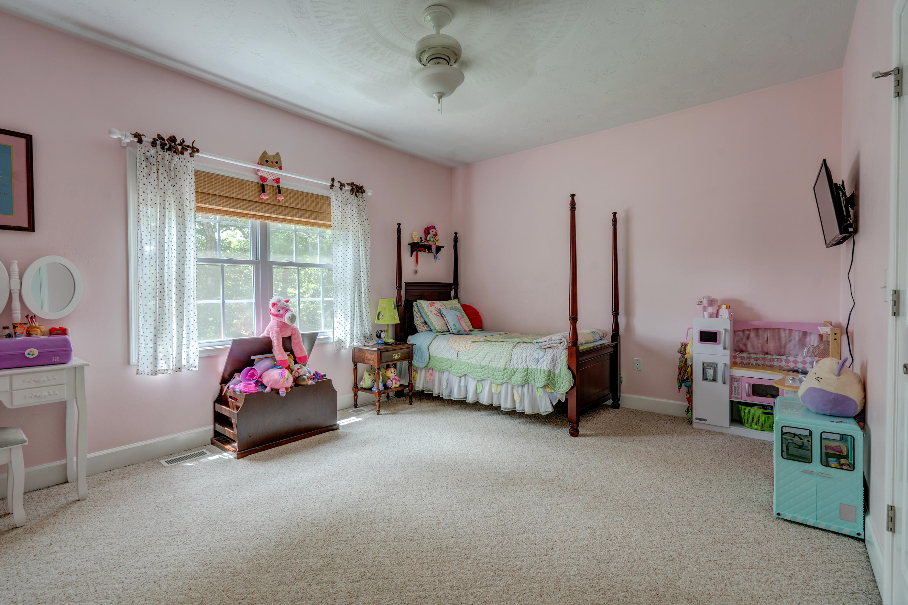 1205 Summit View Road Goodview, VA 24095 - Photo 21 of 46 a bedroom with furniture and a flat tv screen
