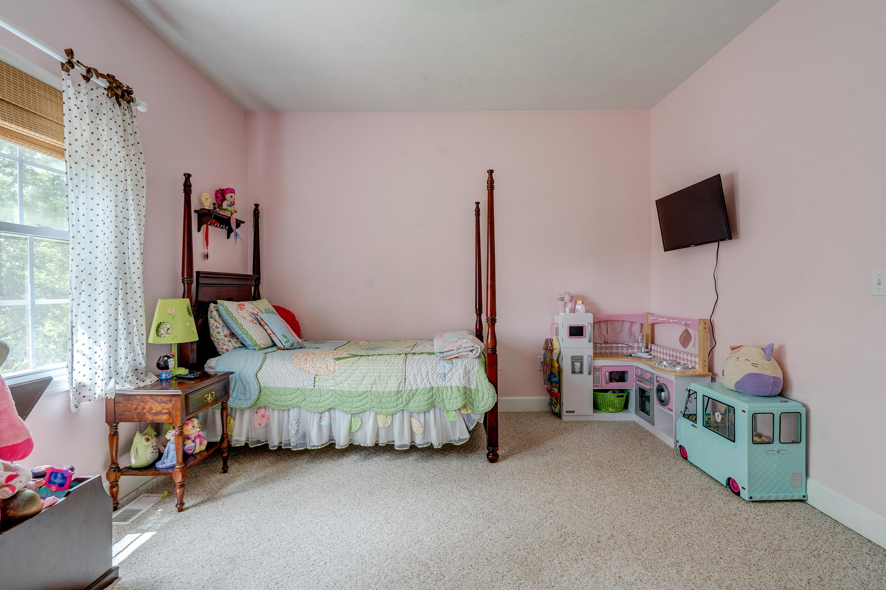1205 Summit View Road Goodview, VA 24095 - Photo 22 of 46 a bedroom with bed and window