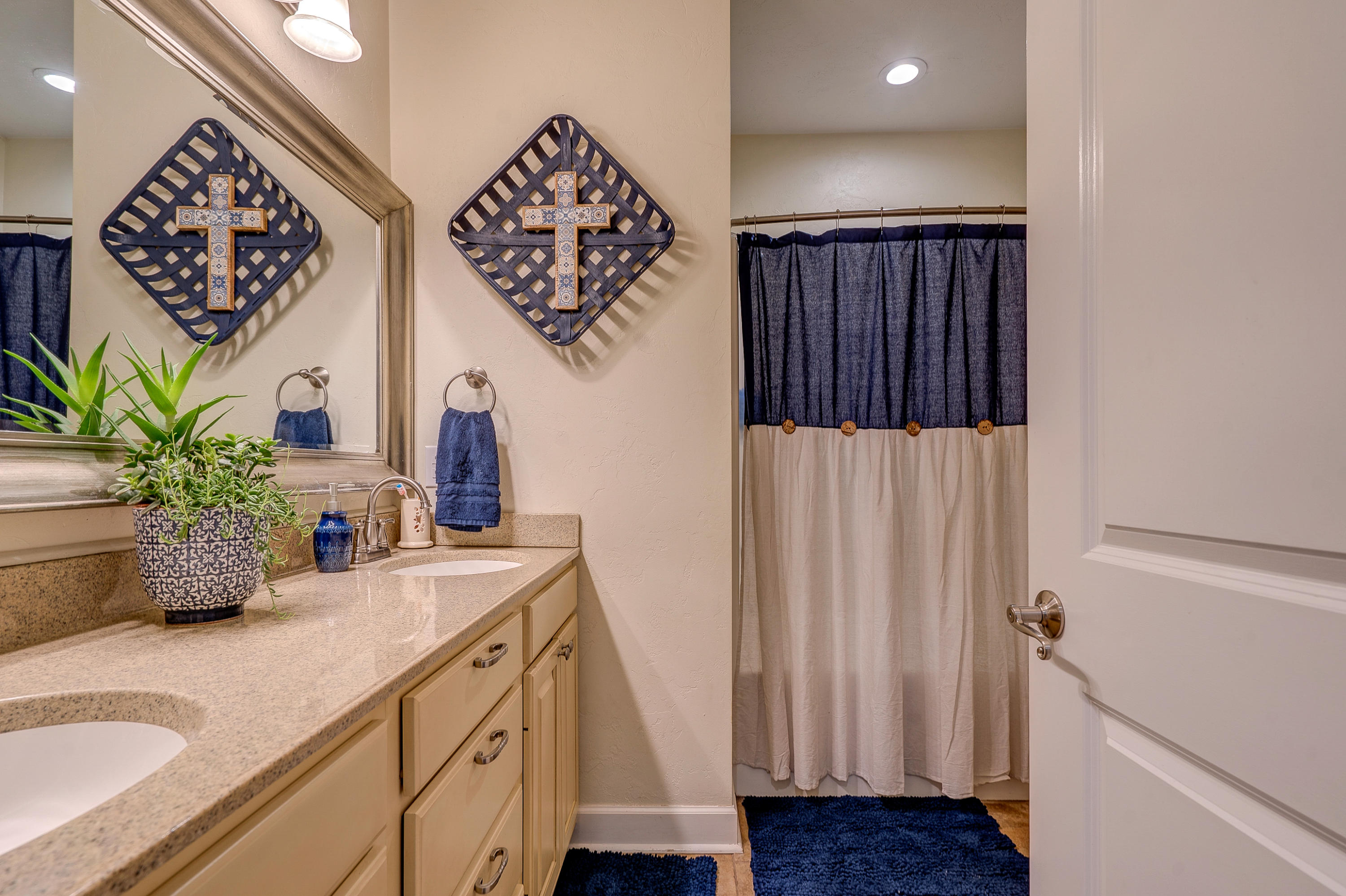 1205 Summit View Road Goodview, VA 24095 - Photo 25 of 46 a bathroom with a sink and a mirror