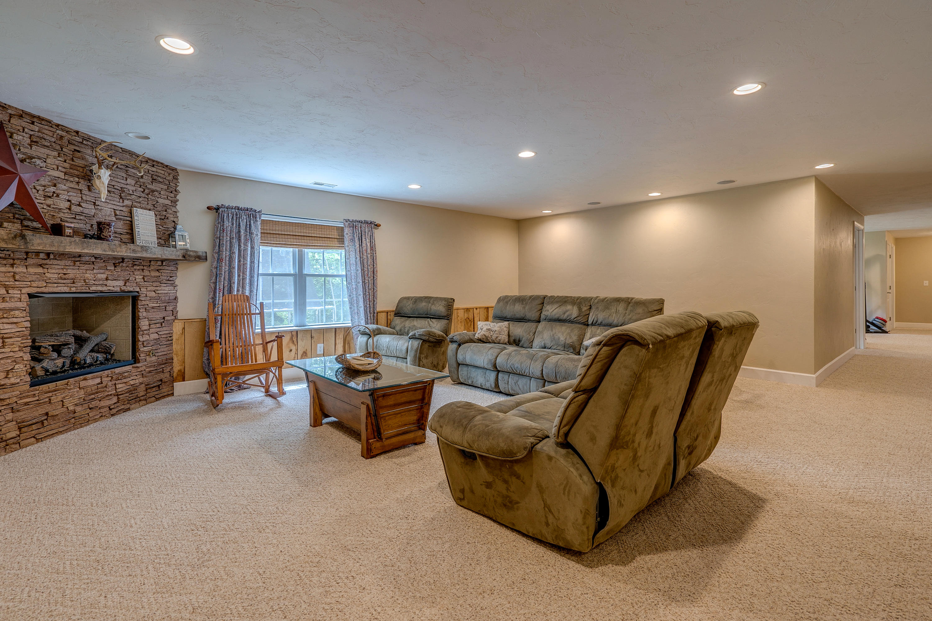 1205 Summit View Road Goodview, VA 24095 - Photo 28 of 46 a living room with furniture and a fireplace