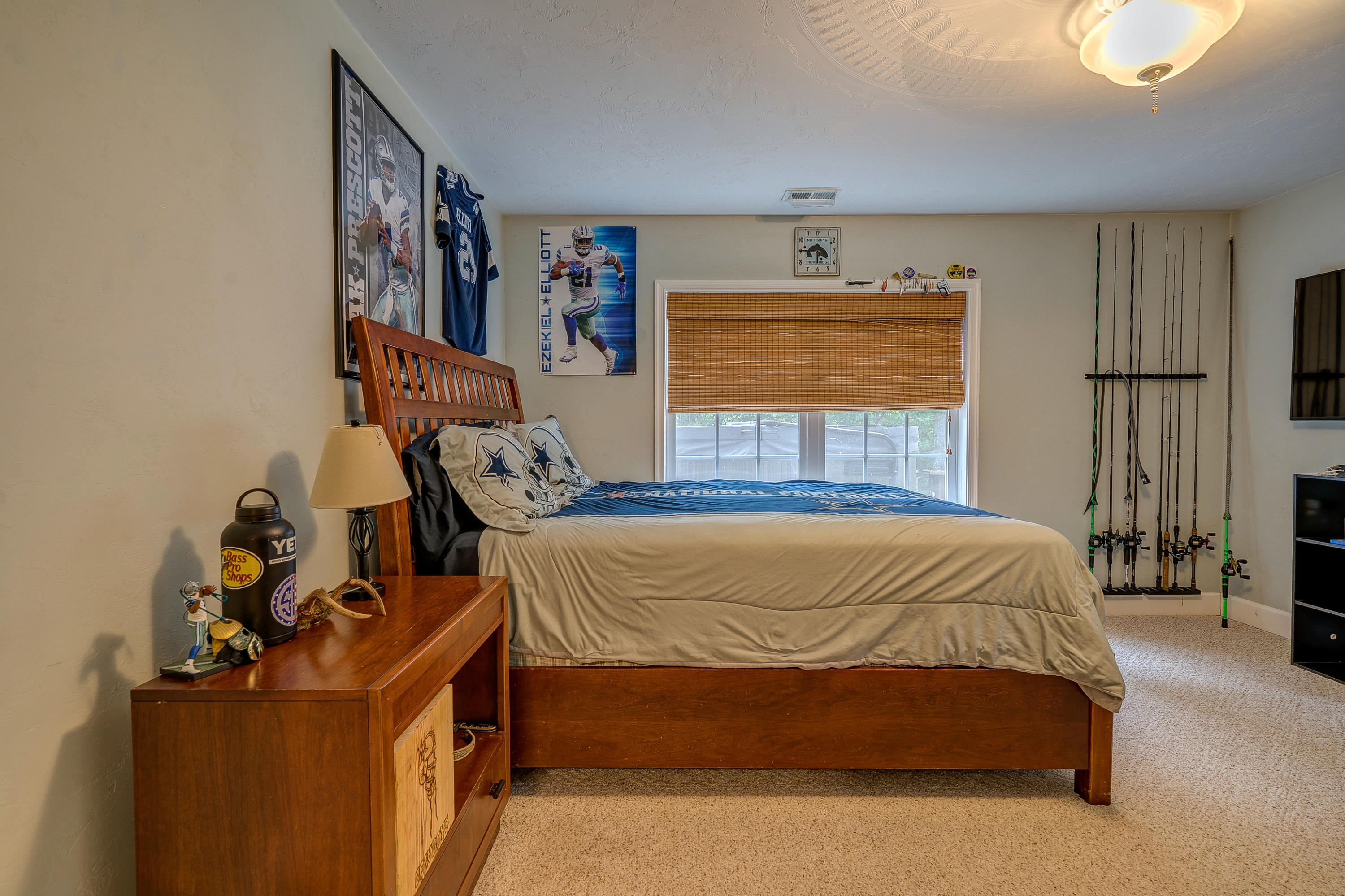 1205 Summit View Road Goodview, VA 24095 - Photo 35 of 46 a bedroom with a bed and large windows