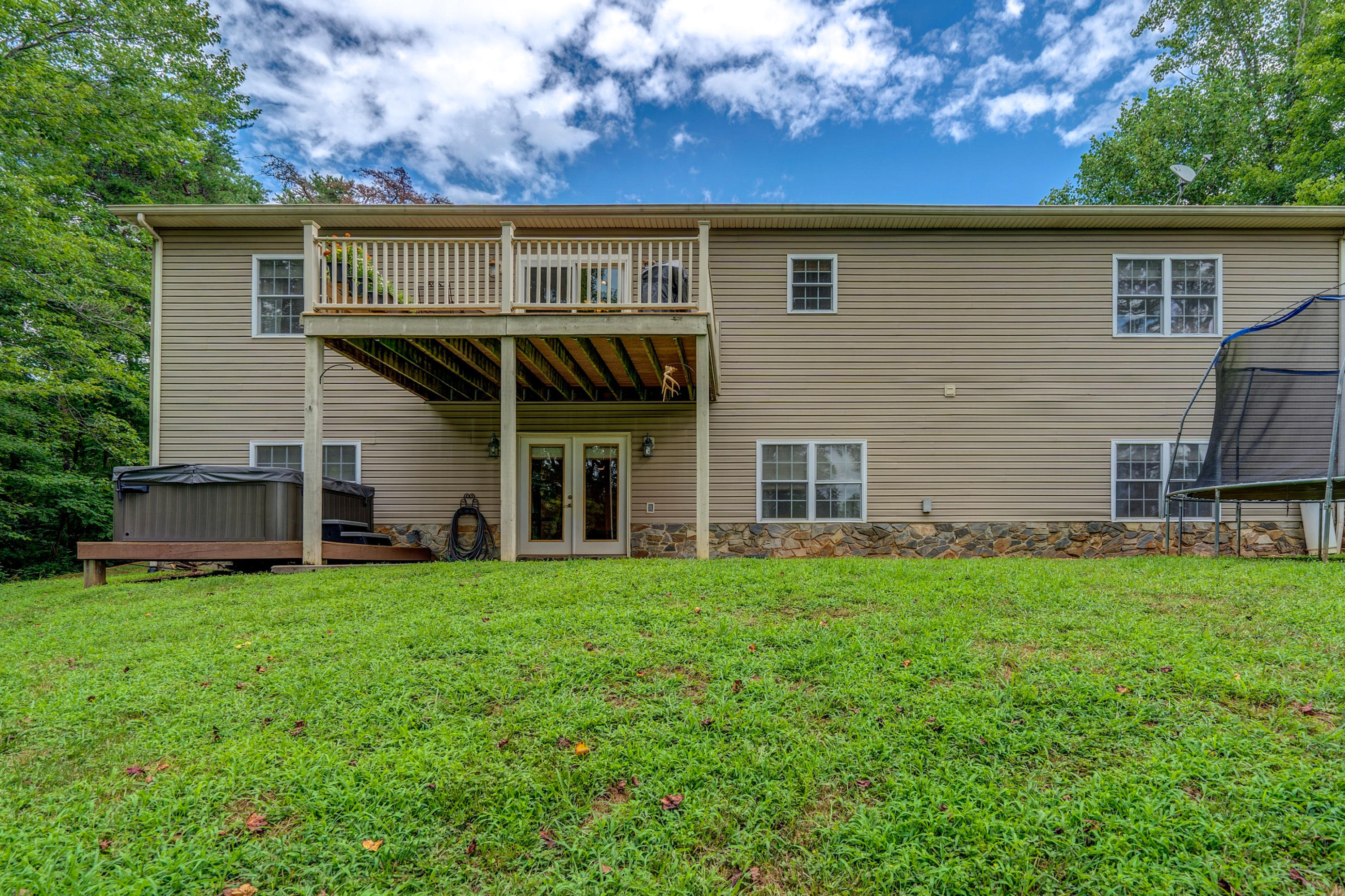 1205 Summit View Road Goodview, VA 24095 - Photo 38 of 46 front view of a house with a yard