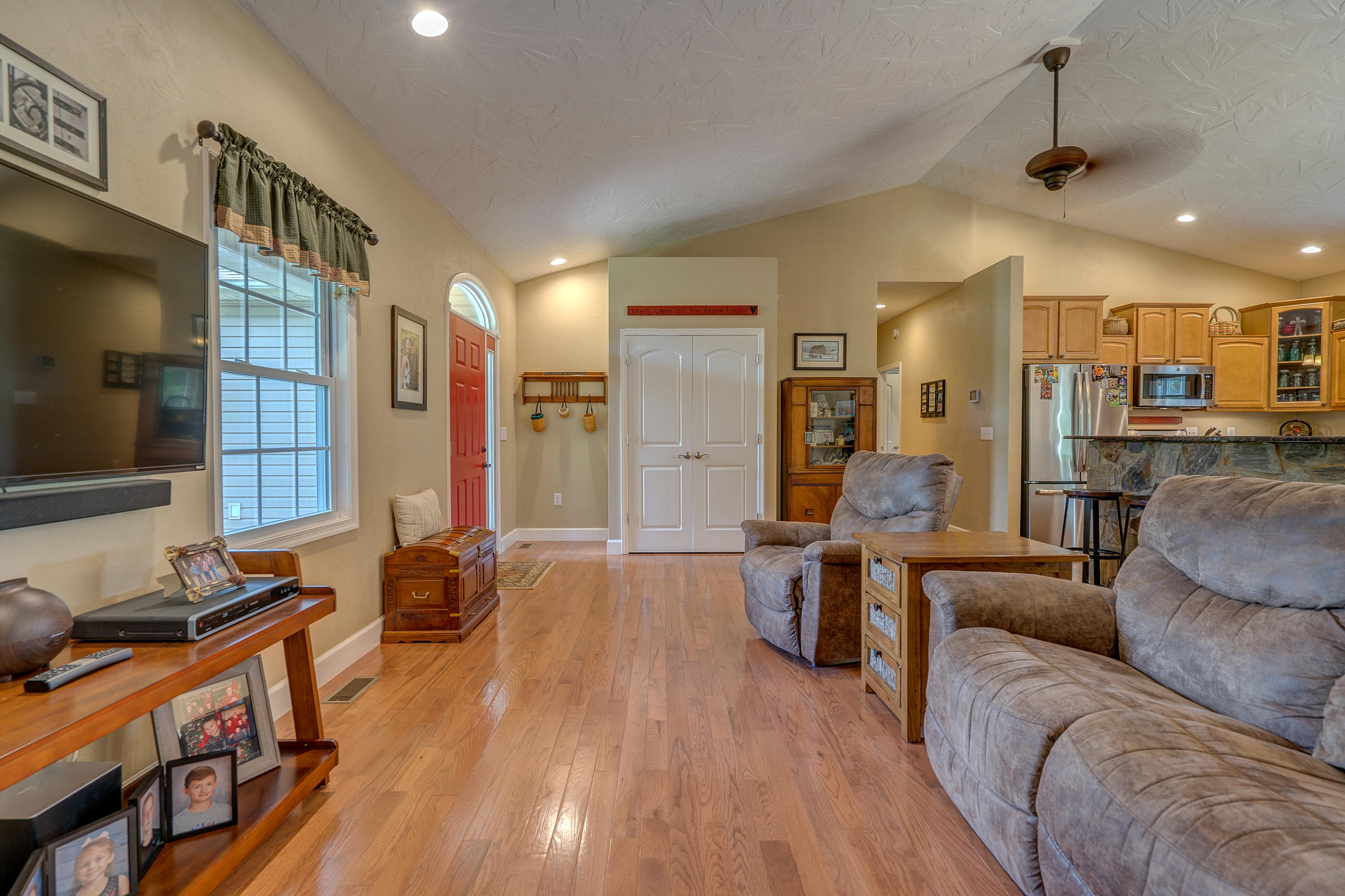 1205 Summit View Road Goodview, VA 24095 - Photo 5 of 46 a living room with furniture and a flat screen tv