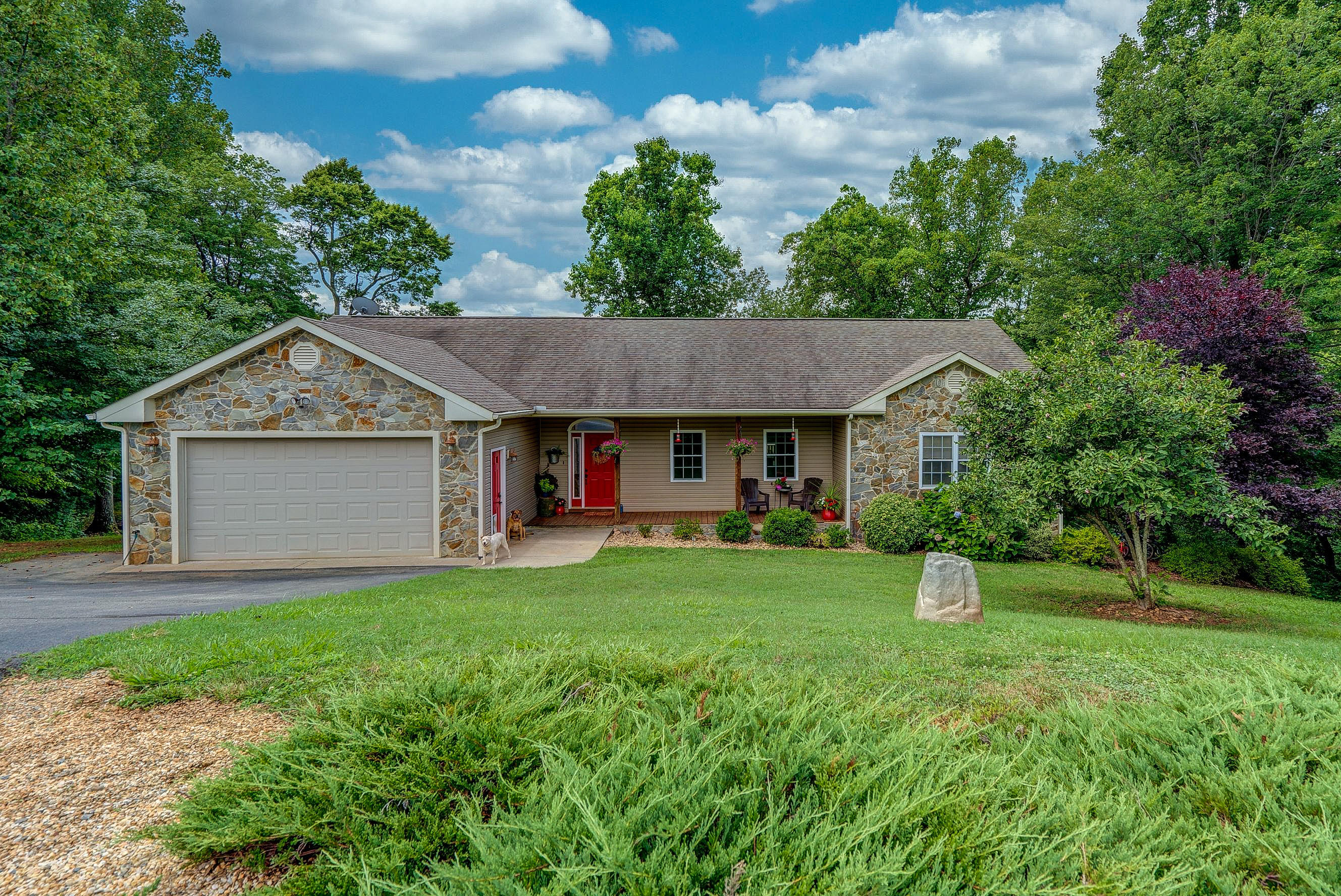 1205 Summit View Road Goodview, VA 24095 - Photo 44 of 46 a view of a house with a yard and potted plants