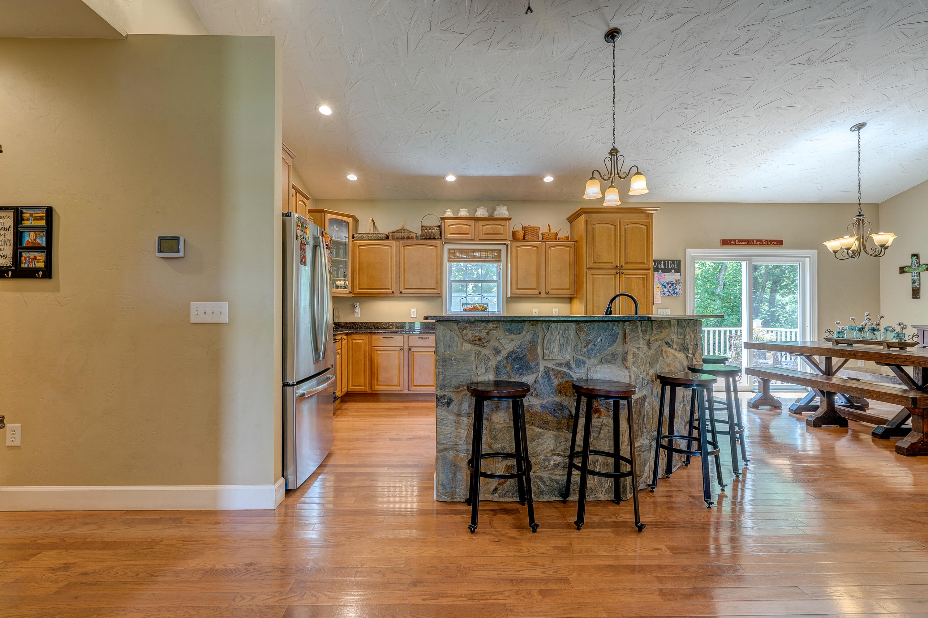 1205 Summit View Road Goodview, VA 24095 - Photo 8 of 46 a large kitchen with a table and chairs