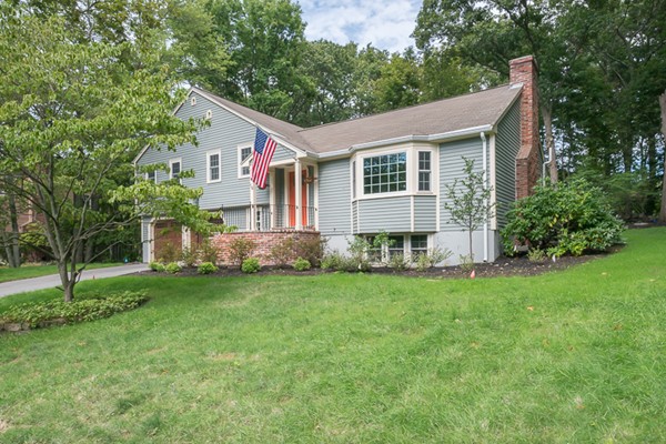 16 Mayflower Road Winchester, MA 01890 - Photo 1 of 23 a front view of house with yard and green space